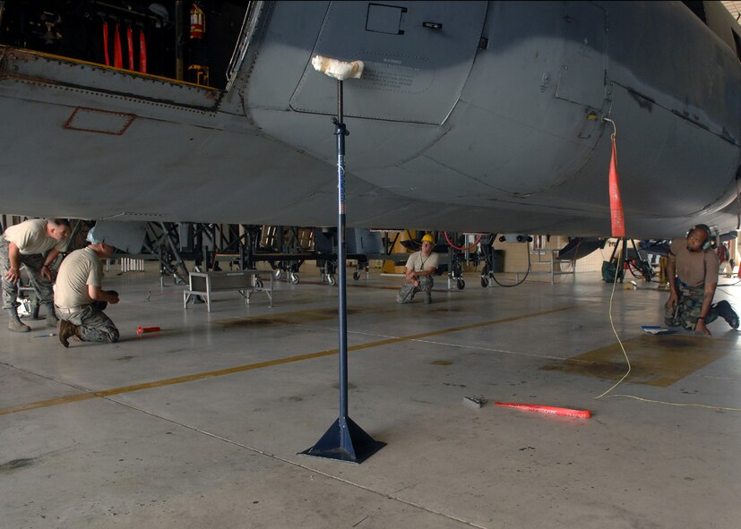 MOODY AIR FORCE BASE, Ga. -- 23rd Equipment Maintenance Squadron Airmen complete an operations check on a HC-130P Hercules here Sept. 5. The Airmen take a close look at the landing gear as a countermeasure for any problems that might occur. (U.S. Air Force photo by Airman Joshua Green) 
