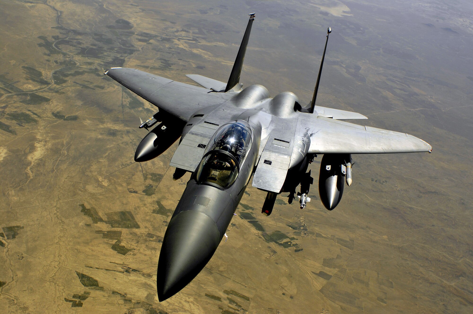 An Air Force F-15E Strike Eagle aircraft returns to the fight after receiving fuel during a mission over Afghanistan. F-15Es provide armed aerial surveillance in support of Operation Enduring Freedom. (U.S. Air Force photo/Master Sgt. Andy Dunaway)
