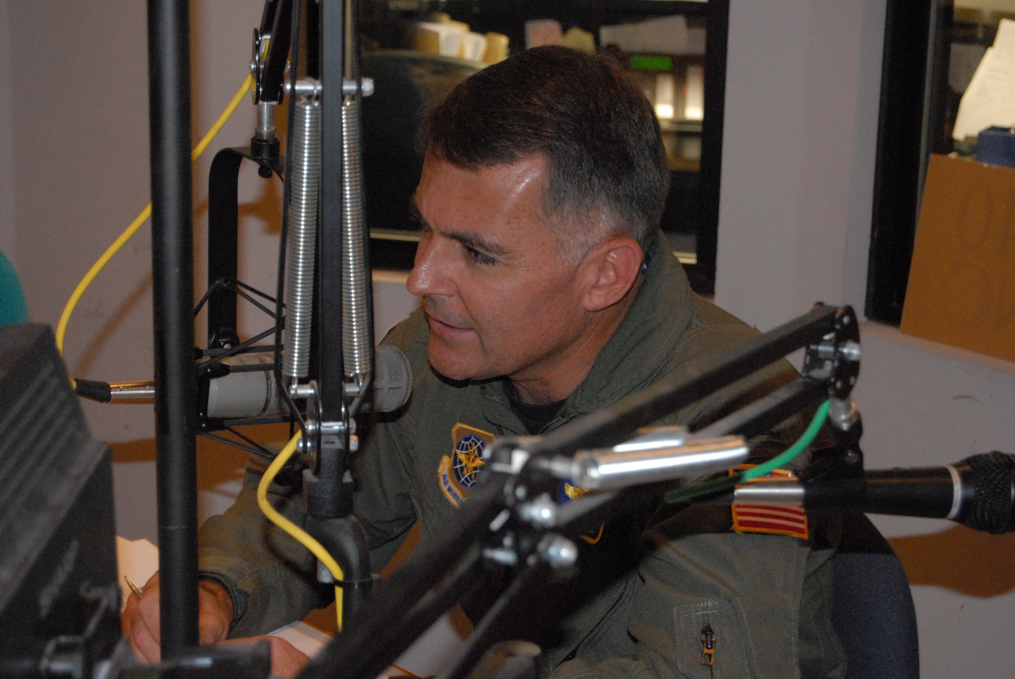 Col. John McDonald, 43rd Airlift Wing Commander, talks about Pope’s mission and how it is changing because of BRAC during a radio interview with WFNC radio Aug. 29. (U.S. Air Force Photo by 2nd Lt. Chris Hoyler)
