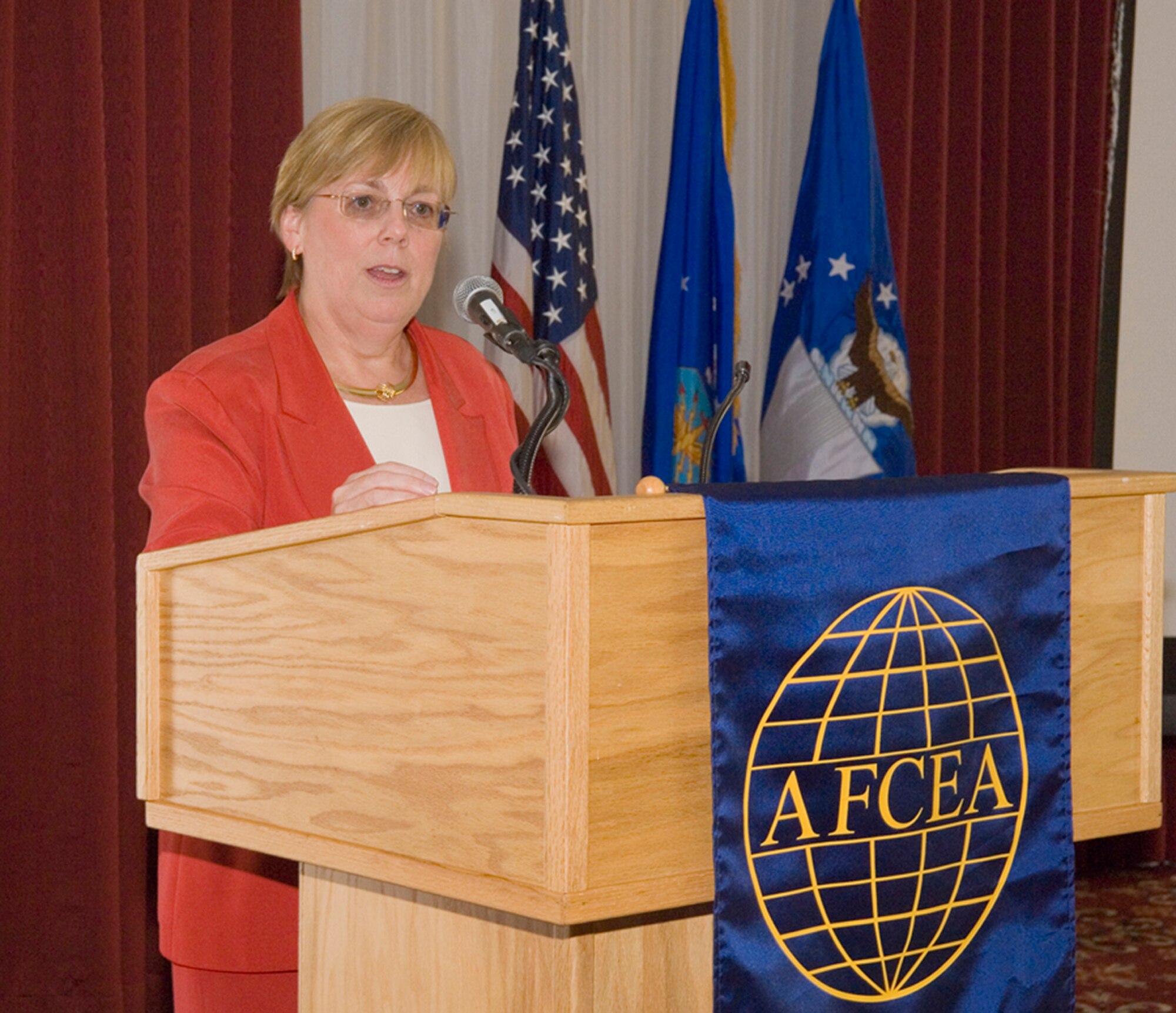 Martha “Marty” Evans, director for Information Dominance Programs within the Office of the Assistant Secretary of the Air Force for Acquisition, speaks to a government-industry gathering at Hanscom AFB, Mass., Sept. 11.  Ms. Evans told the group that the Air Force is spending lots of money on C4ISR, and is looking for big results.  (U.S. Air Force Photo/Rick Berry)
