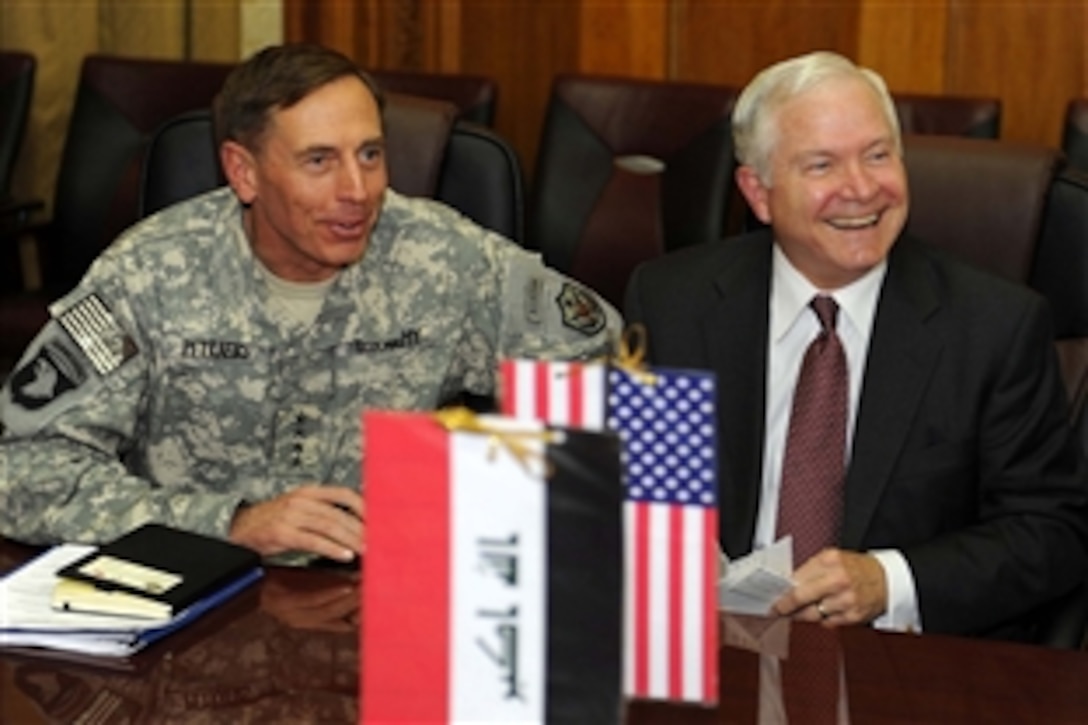 U.S. Defense Secretary Robert M. Gates and U.S. Army Gen. David H. Petraeus, Multinational Force Iraq commanding general, talk at the Iraqi Ministry of Defense in Baghdad, Sept. 15, 2008. Gates is in southwest asia to meet with Iraqi leaders and to preside over the change of the commanding general of Multinational Force Iraq. 