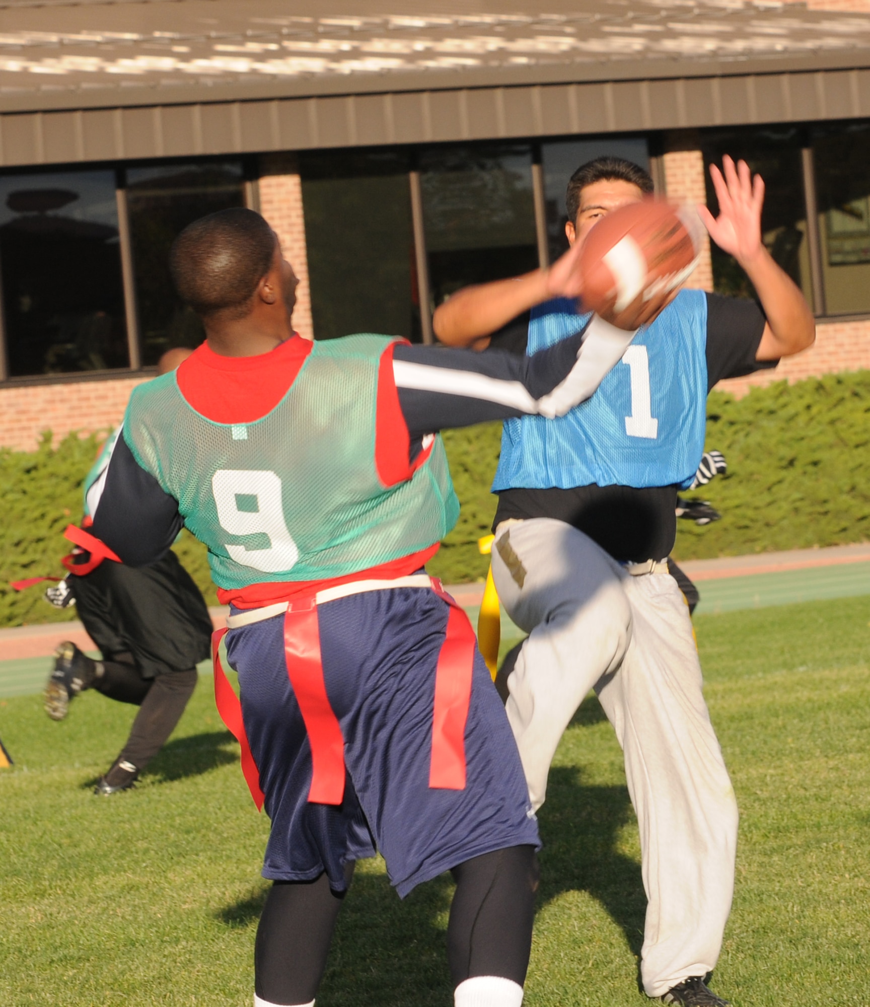 U.S. Northern Command began the 2008 intramural flag football season with a convincing 32-6 victory over the 21st Civil Engineer Squadron. But that wasn’t even the story that makes this year’s edition of Northcom football notable. (CSMNG photo/Walt Johnson)
