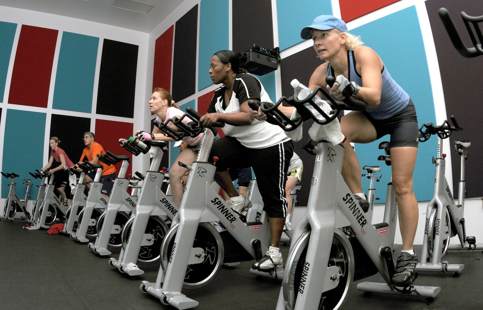 Cycle members go through the motions of a 45-minute spinning class, offered six times a week at Rambler Fitness Center Sept. 15. (U.S. Air Force photo by Rich McFadden)