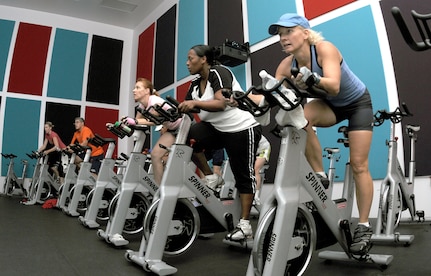 Cycle members go through the motions of a 45-minute spinning class, offered six times a week at Rambler Fitness Center Sept. 15. (U.S. Air Force photo by Rich McFadden)