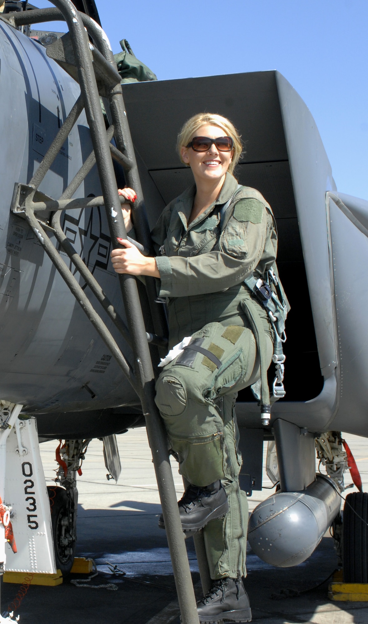 MOUNTAIN HOME AIR FORCE BASE, Idaho -- Jonelle Merrill, KTVB Channel 7 reporter, climbs in to an F-15E Strike Eagle belonging to the 391st Fighter Squadron for her incentive flight Sept. 9. Base leadership used the incentive flights to strengthen ties between the base and local news outlets. (U.S. Air Force photo/ Airman 1st Class Deborah Young)