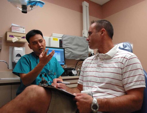 Maj. Lance Kim, a general dentist assigned to the 926th Aerospace Medicine Flight, answers questions with Maj. Russell Brown, 15th Reconnaissance Squadron assistant director of operations. The 926th Group is an Air Force Reserve unit under the 10th Air Force, Naval Air Station Joint Reserve Base, Fort Worth, Texas. The group is located at Nellis AFB as an associate unit to the United States Air Force Warfare Center. Through Total Force Integration, reservists are integrated into regular Air Force units, accomplishing the USAFWC's mission alongside REGAF personnel on a daily basis.
(U.S. Air Force Photo/Senior Airman Larry E. Reid Jr.)
