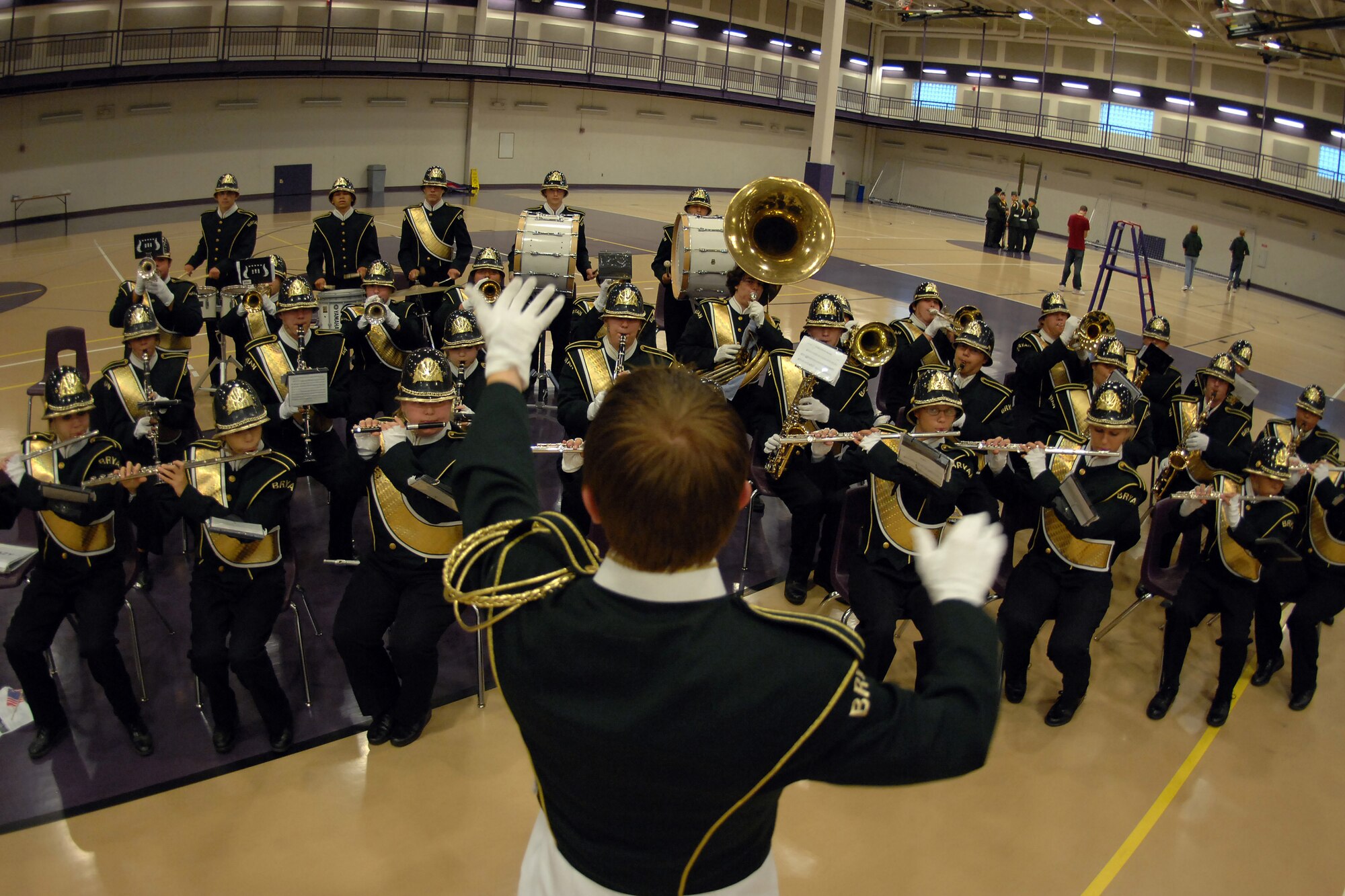 OFFUTT AIR FORCE BASE, Neb.--The Bryan High School Marching Band performs during a special tribute held at the Bellevue Lied Center Sept. 11 in honor of those who lost their lives during the attacks of Sept. 11, 2001. (U.S. Air Force Photo By Josh Plueger)