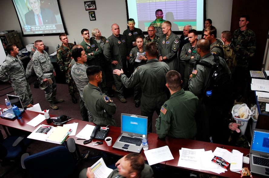 331st AIR EXPEDITIONARY GROUP, RANDOLPH AIR FORCE BASE, Texas -- Airmen in the 331st Air Expeditionary Group listen to a pre-mission rescue briefing at Randolph Air Force Base, Texas, Sept. 14.  The ROC belonged to the 23rd Wing based at Moody Air Force Base, Ga., and was responsible for the command and control of all Air Force rescue efforts in the aftermath of Hurricane Ike.  (U.S. Air Force photo by Tech. Sgt. Parker Gyokeres)