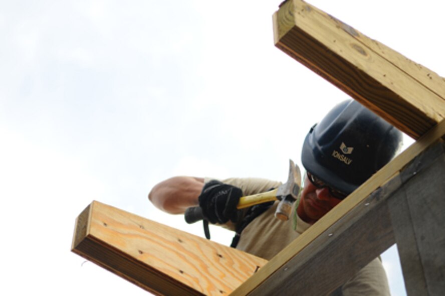 LOS ALPES, Colombia -- Staff Sgt. Richard Monsalve, 5th Civil Engineer Squadron heating, ventilation, air conditioning craftsman, works on a construction project here recently while deployed in support of Continuing Promise 2008. CP 2008 is a collaborative effort between the United States and partner militaries, non-governmental organizations, and partner-nation support organizations to build strong partnerships that can be called upon in the event of a regional situation requiring cooperative solutions. (Courtesy photo)