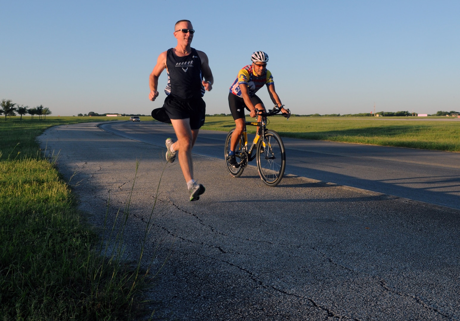 Bill Relyea, left, and Orlando Gonzales competed together to top 17 other teams in the Randolph Biathlon Aug. 30. (U.S. Air Force photo by Rich McFadden)