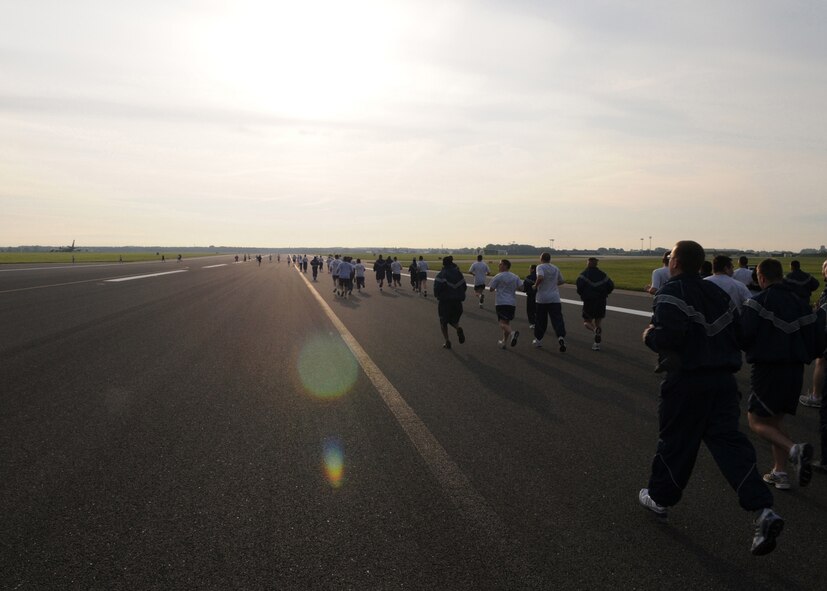Airmen run down the runway during the POW/MIA Remembrance Week 5k Run Sept. 15, 2008, at RAF Mildenhall. The run kicked off the POW/MIA Remembrance Week which runs Sept. 15 through19. (U.S. Air Force photo by Staff Sergeant Jerry Fleshman)