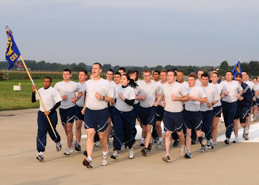 Airmen from the 100th Civil Engineer Squadron, run in formation during the Prisoner of war, Missing in Action 5k remembrance run Sept. 15, 2008, at RAF Mildenhall, England. The run kicked off POW/MIA Remembrance Week September 15 through 19. The week provide Team Mildenhall an opportunity to pay respect, and honor all individuals who became prisoners of war and the men and woman missing in action. (U.S. Air Force photo by Staff Sergeant Jerry Fleshman)