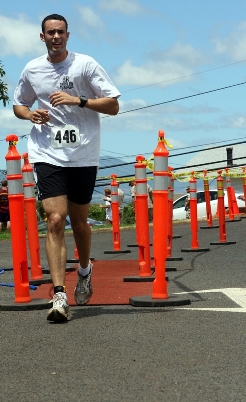 Anthony Langford strides to the finish line during the 12th Annual 5K Grueler Sept. 17.