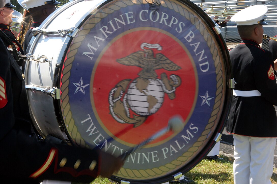 Vibrations from the MCAGCC 29 Palms Band, echoes across the football field of Southwest High School during a performance for the school band in Green Bay, Wis., Sept. 17.  The band conducted nearly 20 performances at 13 venues throughout the state during their week long tour.