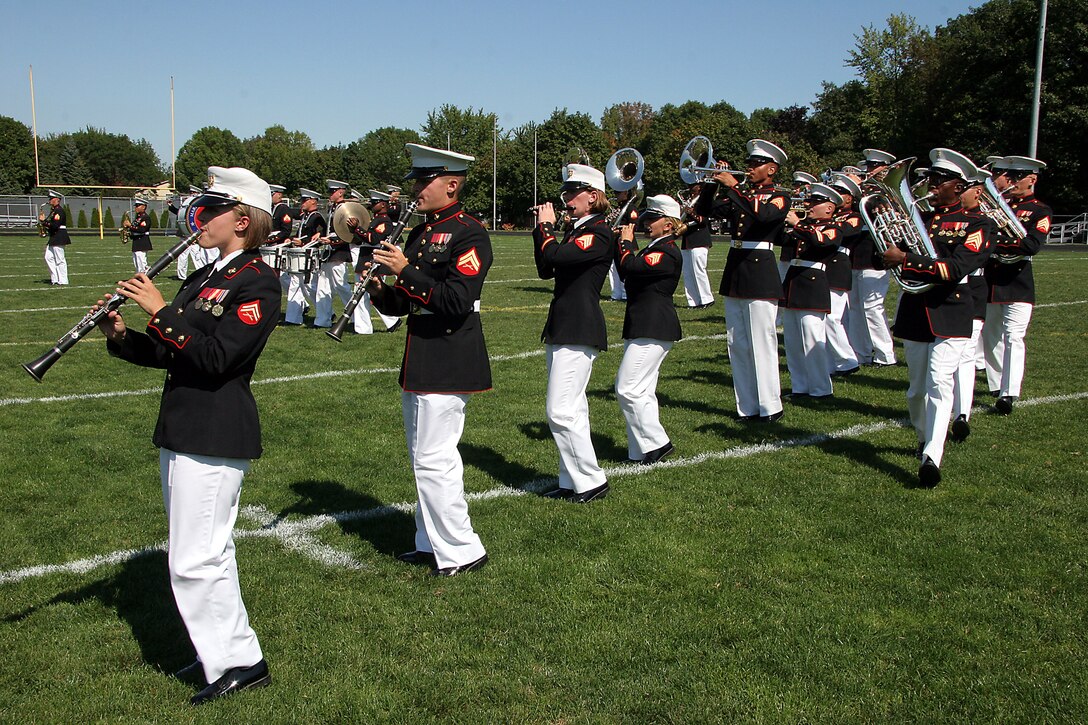 The MCAGCC 29 Palms Band demonstrates their marching abilities for the students of Southwest High School in Green Bay, Wis., Sept. 17.  The band conducted nearly 20 performances at 13 venues throughout the state during their week long tour.