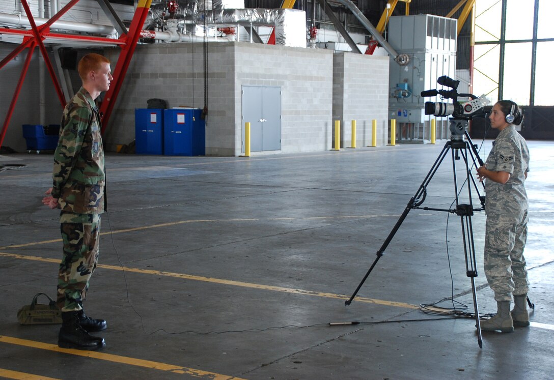 Airman First Class Steve Kempker from the 932nd Airlift Wing Maintenance Group, is interviewed by the public affairs office during a documentary paying tribute to the work of the maintainers at the Air Force Reserve wing. They are the men and women who take care of the "birds of steel" both before and after flights.  (U.S. photo by Maj. Stan Paregien)
