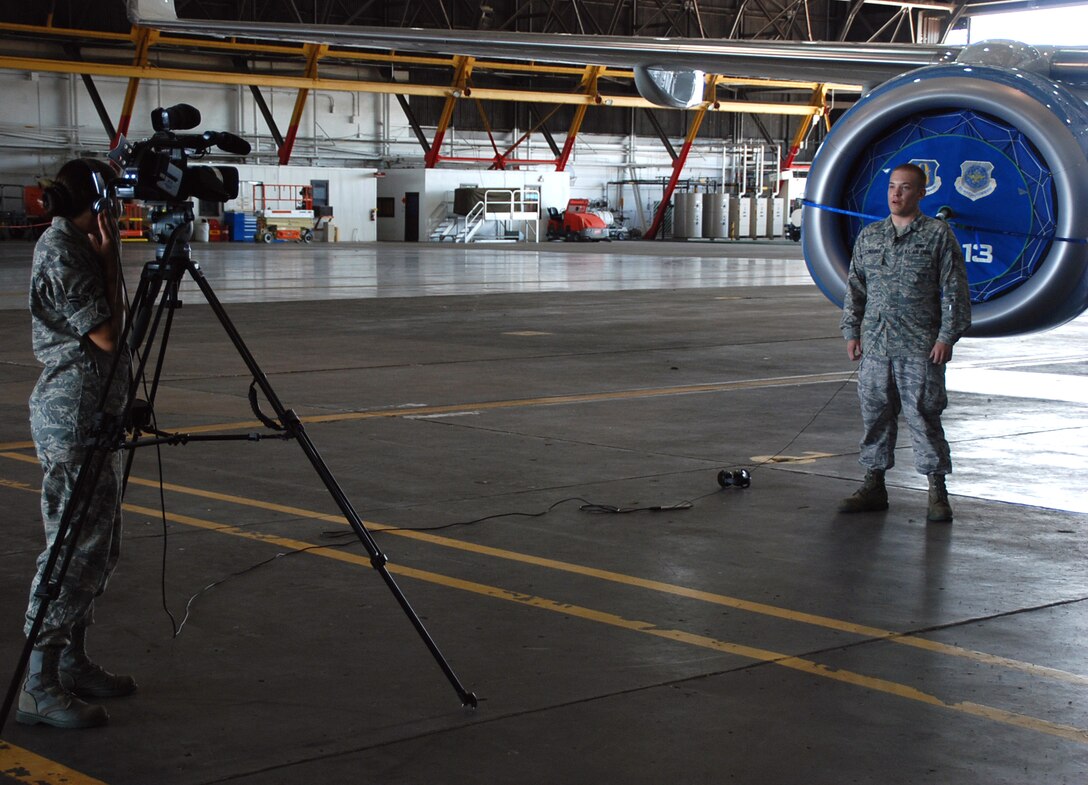 Airman First Class Jacob Schnauber,  from the 932nd Airlift Wing Maintenance Group, is interviewed by the public affairs office during a documentary paying tribute to the work of the maintainers at the Air Force Reserve wing.  U.S. photo by Maj. Stan Paregien
