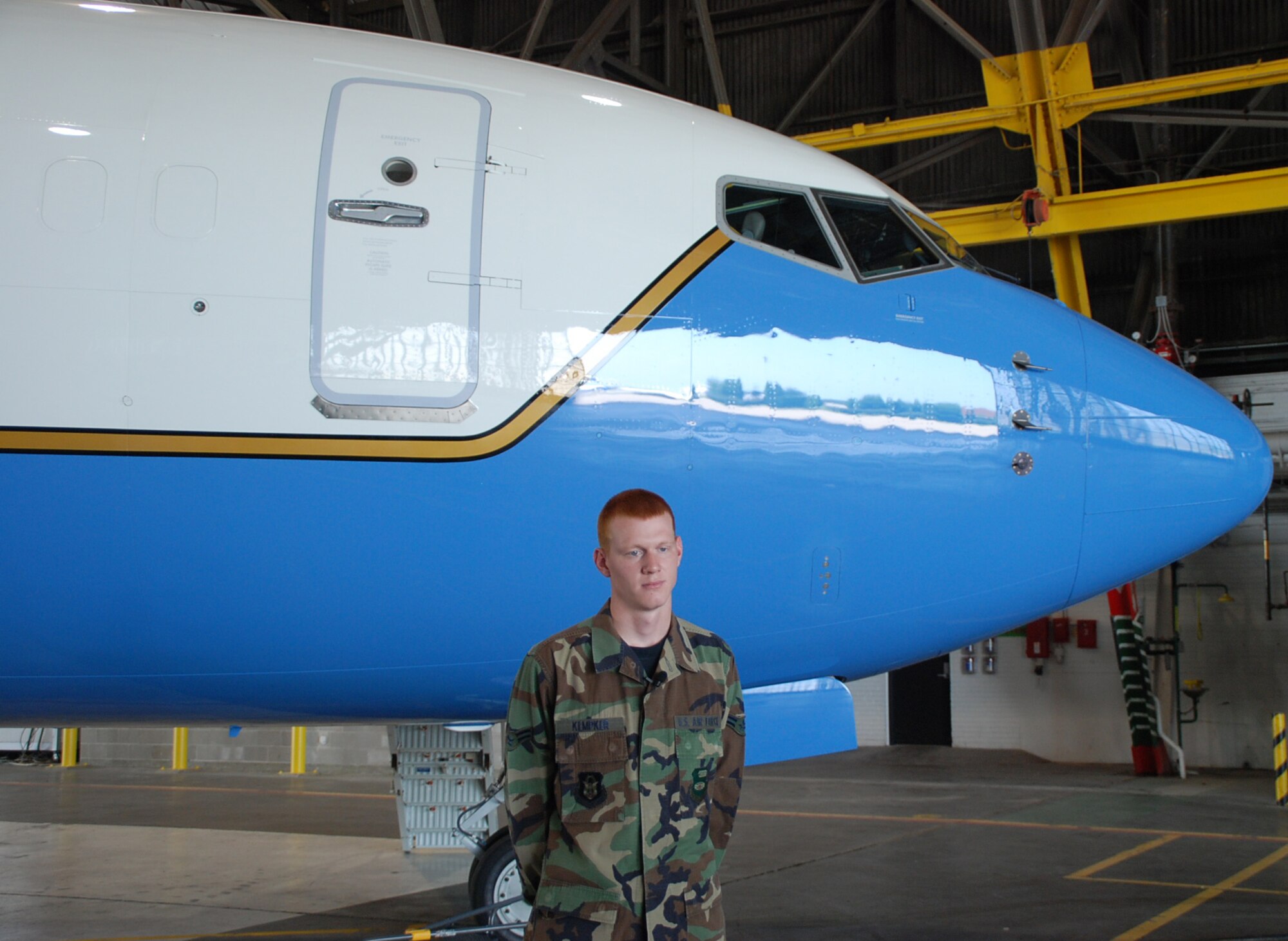 Airman First Class Steve Kempker, from the 932nd Airlift Wing Maintenance Group, is interviewed by the public affairs office during a documentary paying tribute to the work of the maintainers at the Air Force Reserve wing. U.S. photo by Maj. Stan Paregien

