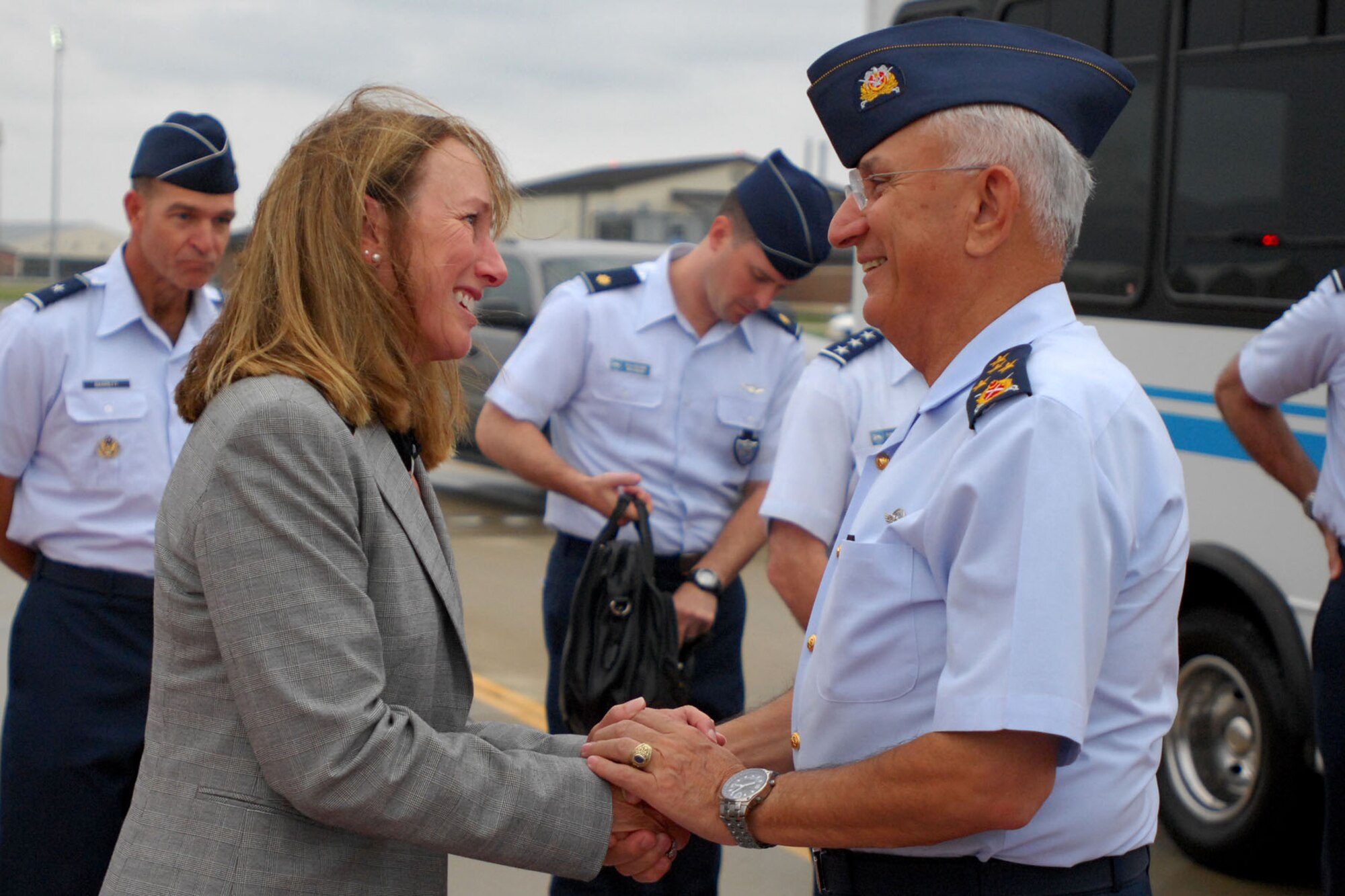 LANGLEY AIR FORCE BASE, Va. -- Gen. Aydongan Babaoglu, commander of the Turkish air force, is greeted by Lori Worden, wife of Maj. Gen. R. Mike Worden, on the flightline upon his arrival here Sept 10. General Babaoglu toured the base, including a static display of the F-22 Raptor, during his short visit. (U.S. Air Force photo/Airman Rebecca Montez)
