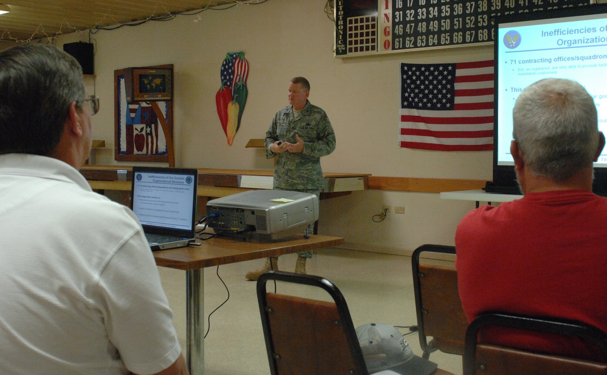 WHITEMAN AIR FORCE BASE, Mo. - Col. Steve Elliott, 788th Installation Acquisition Group provisional director, discusses Sept. 5 with local small business owners some of the changes the Installation Acquisition Transsformation program will bring to the Air Force in terms of contracts and local small businesses. IAT is an Air Force-wide initiative to modify contracting business practices at the Continental United States Installation level to create a more efficient acquisition process. (U.S. Air Force photo/Staff Sgt. Jason Barebo)