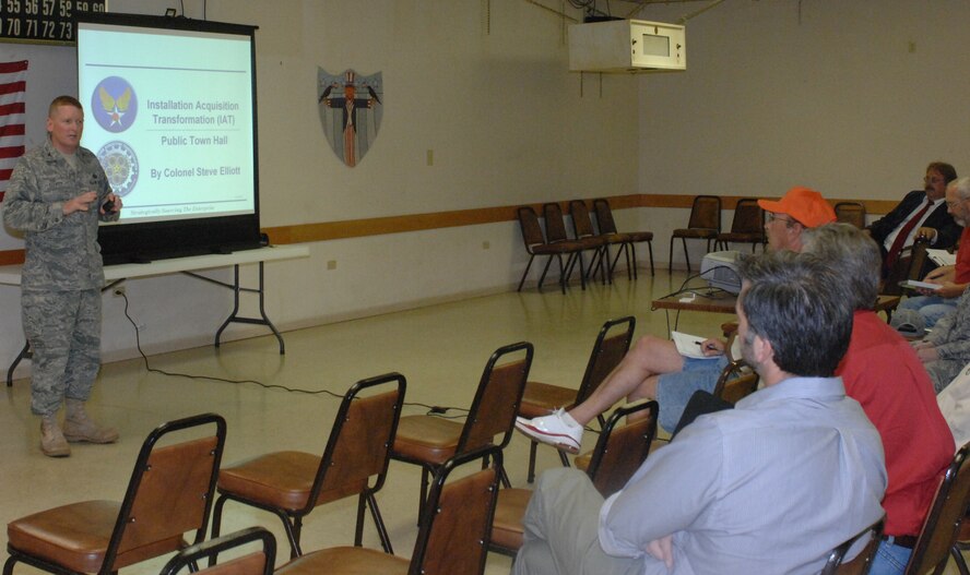 WHITEMAN AIR FORCE BASE, Mo. - Col. Steve Elliott, 788th Installation Acquisition Group provisional director, discusses Sept. 5 with local small business owners some of the changes the Installation Acquisition Transsformation program will bring to the Air Force in terms of contracts and local small businesses. IAT is an Air Force-wide initiative to modify contracting business practices at the Continental United States Installation level to create a more efficient acquisition process. (U.S. Air Force photo/Staff Sgt. Jason Barebo)