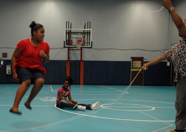 Sekai Thomas does double dutch at the Youth Programs gym on Charleston AFB Sept. 12. The jump roping activity was part of FitFactor, which is a program designed to help keep kids active. Sekai is the 9-year-old daughter of Staff Sgt. Lakeisha Thomas. (U.S. Air Force photo/Airman 1st Class Katie Gieratz)