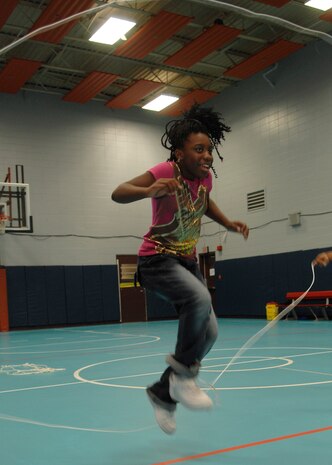Monae Mitchell does double dutch at the Youth Programs gym on Charleston AFB Sept. 12. The jump roping activity was part of FitFactor, which is a program designed to help keep kids active. Monae is the 10-year-old daughter of Marion Mitchell. (U.S. Air Force photo/Airman 1st Class Katie Gieratz)