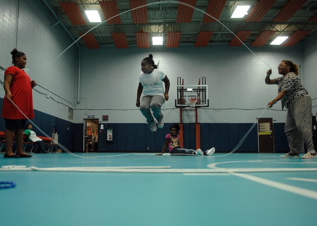 Donaishia Jenkins does double dutch at the Youth Programs gym on Charleston AFB Sept. 12.  The jump roping activity was part of Fit Factor, which is a program designed to help keep kids active. Donaishia is the 9-year-old daughter of Senior Airman Clarence Jenkins. (U.S. Air Force photo/Airman 1st Class Katie Gieratz)
