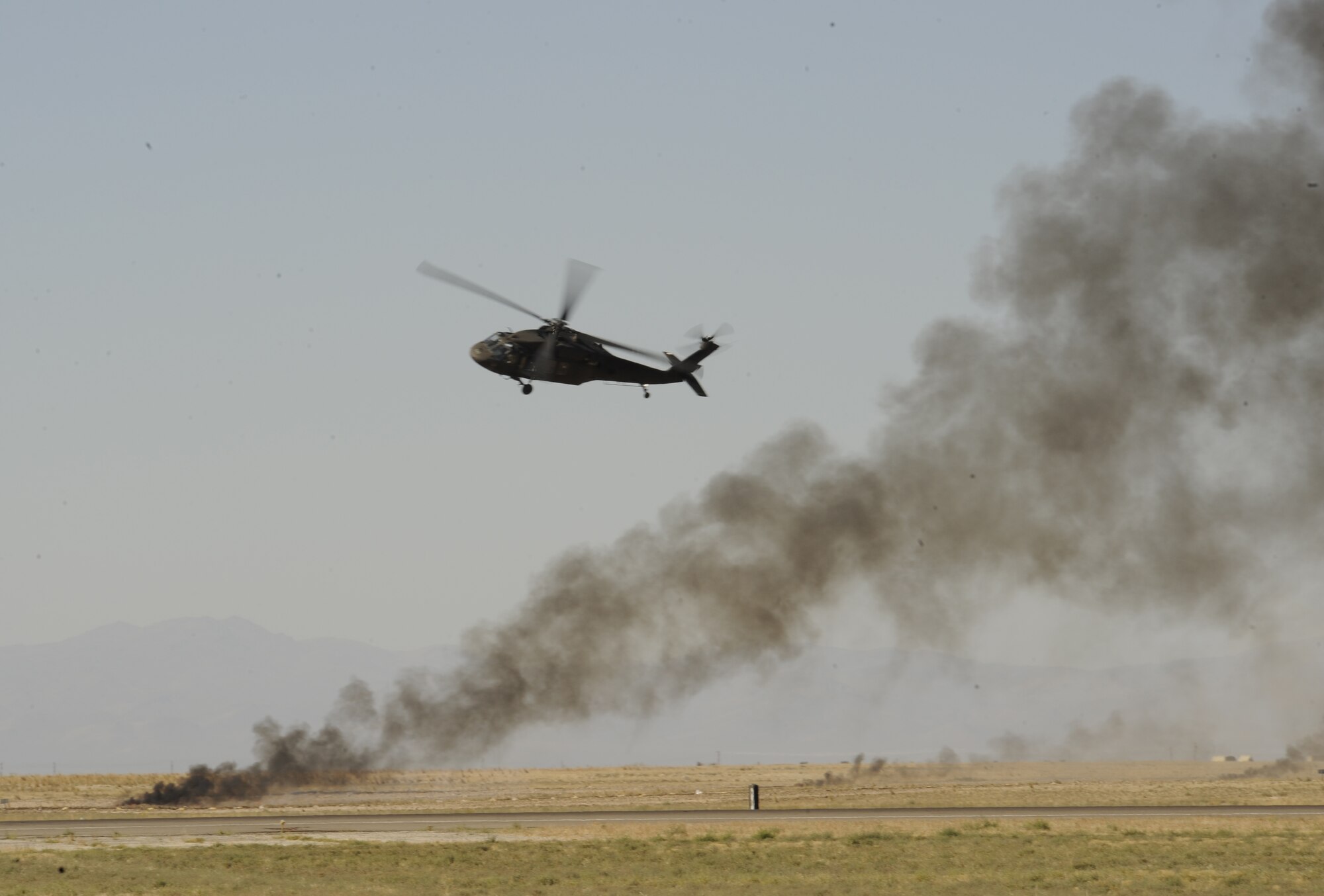 MOUNTAIN HOME AIR FORCE BASE, Idaho – An Army Guard AH-64 Apache Attack helicopter conducts a close air support demonstration with live pyrotechnics during a demonstration with the 366th Fighter Wing during Gunfighter Skies 2008 at Mountain Home Air Force Base. The event was a way for the Gunfighters to thank the people of Southern Idaho for their support. (U.S. Air Force photo\ Airman 1st Class Stephany Miller)