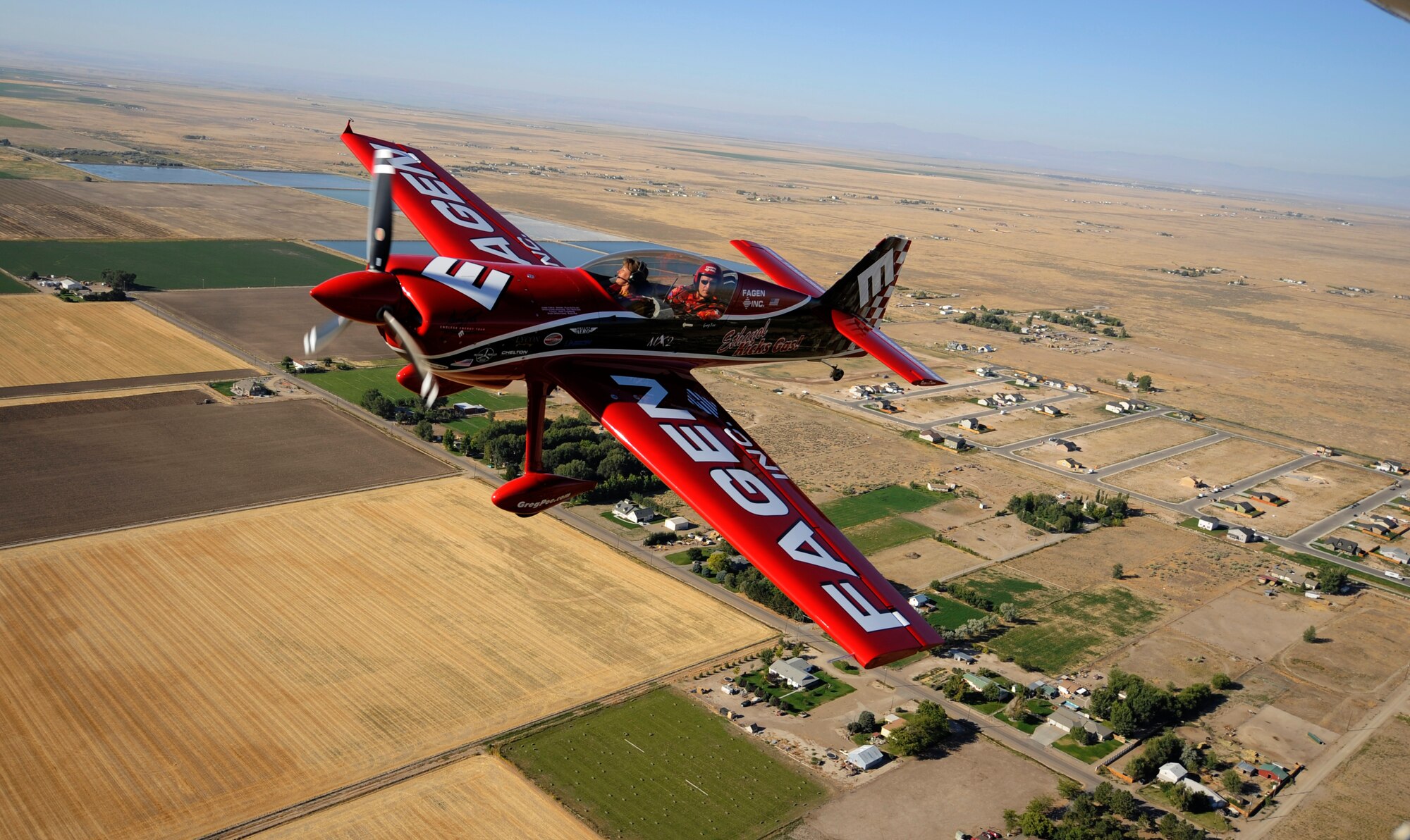 MOUNTAIN HOME AIR FORCE BASE, Idaho - A Fagen Inc. Cessna plane operated by Greg Poe flies over Mountain Home, Idaho, Sept. 12. The Fagen Inc. stunt teams are in town to perform in the Gunfighter Skies 2008 air show at Mountain Home Air Force Base, Idaho. (U.S. Air Force photo/ Airman 1st Class Stephany Miller)
