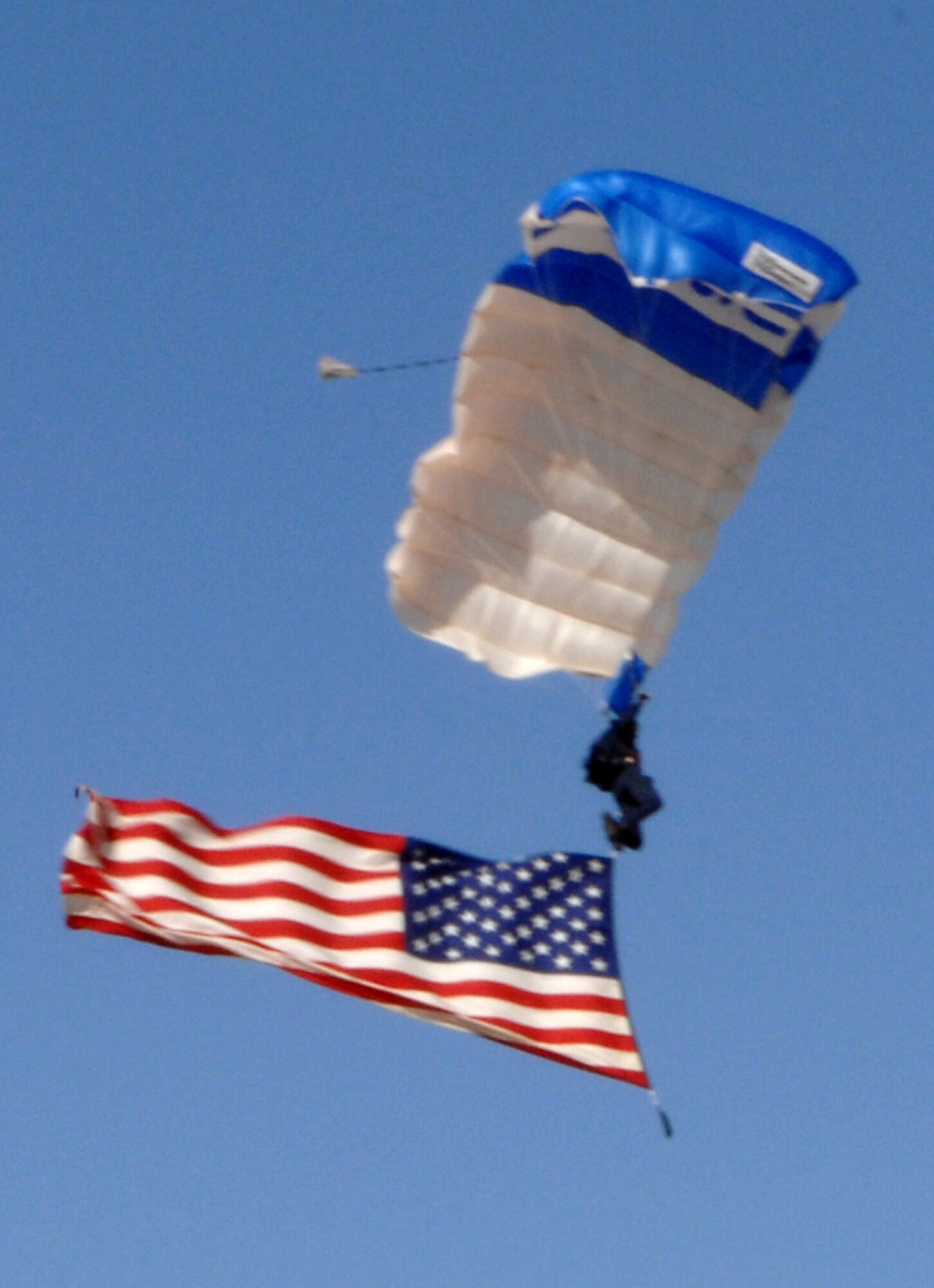 MOUNTAIN HOME AIR FORCE BASE, Idaho – The U.S. Air Force Academy Wings of Blue parachute team delivered the colors during the opening ceremony of Gunfighter Skies 2008 held Sept. 13 and 14 at Mountain Home Air Force Base. The event was a way for the Gunfighters to thank the people of Southern Idaho for their support. (U.S. Air Force photo\ Airman 1st Class Ashley Tank)
