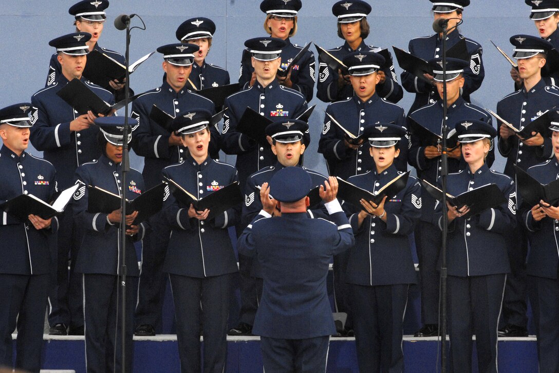 The U.S. Air Force Singing Sergeants perform the American folk song "Shenandoah" at the Pentagon Memorial Dedication Ceremony on Sept. 11, 2008. Under the direction of Col. Dennis M. Layendecker, The U.S. Air Force Concert Band and Singing Sergeants provided a moving musical tribute to those who lost their lives at the Pentagon on Sept. 11, 2001. (Defense Dept. photo by Andy Morataya)