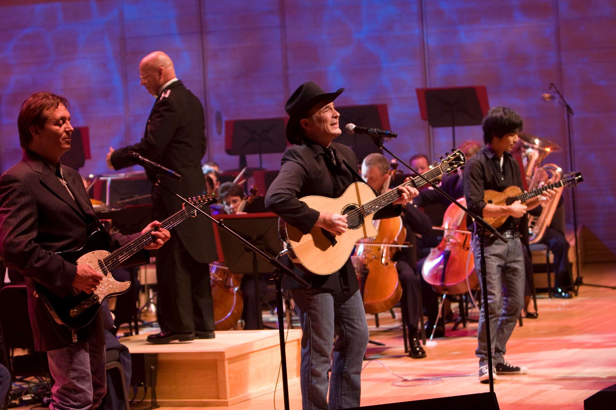 Country Music superstar Clint Black regaled the audience with his hit songs “The Shoes You’re Wearing” and “Spend My Time” as part of the U.S. Air Force Band television special titled “America’s Veterans: A Musical Tribute.” The show was taped at the Music Center at Strathmore in North Bethesda, Md., and will air nationally on public television and overseas on American Forces Network over the Veterans Day holiday. Also appearing on the program are two-time Grammy Award-winner Patti LaBelle, Academy Award-winning Actor Cliff Robertson and ukulele master Jake Shimabukuro. (Official Air Force photo by Senior Master Sgt. Robert Mesite)