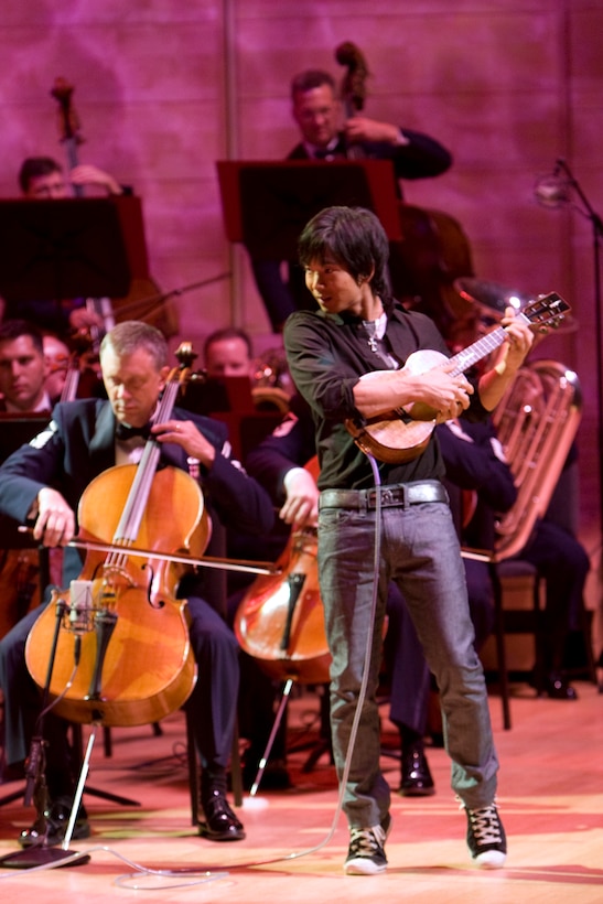 Ukulele master Jake Shimabukuro performed mesmerized the audience with his version of “While My Guitar Gently Weeps” as part of the U.S. Air Force Band television special titled “America’s Veterans: A Musical Tribute.” The show was taped at the Music Center at Strathmore in North Bethesda, Md., and will air nationally on public television and overseas on American Forces Network over the Veterans Day holiday. Also appearing on the program are two-time Grammy Award-winner Patti LaBelle, country music superstar Clint Black and Academy Award-winning Actor Cliff Robertson. (Official Air Force photo by Senior Master Sgt. Robert Mesite)
