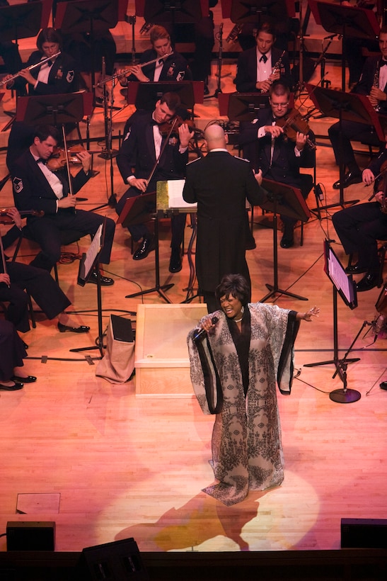 Grammy Award-winning singer Patti LaBelle delivers a stunning performance with The U.S. Air Force Orchestra for a TV Special titled "America's Veterans: A Musical Tribute," taped at the Music Center at Strathmore in North Bethesda, Md. The show features appearances by Patti LaBelle, Clint Black, Cliff Robertson and Jake Shimabukuro. It will air nationally on public television and overseas on American Forces Network over the 2008 Veterans Day holiday. (Official Air Force photo by Senior Master Sgt. Robert Mesite)