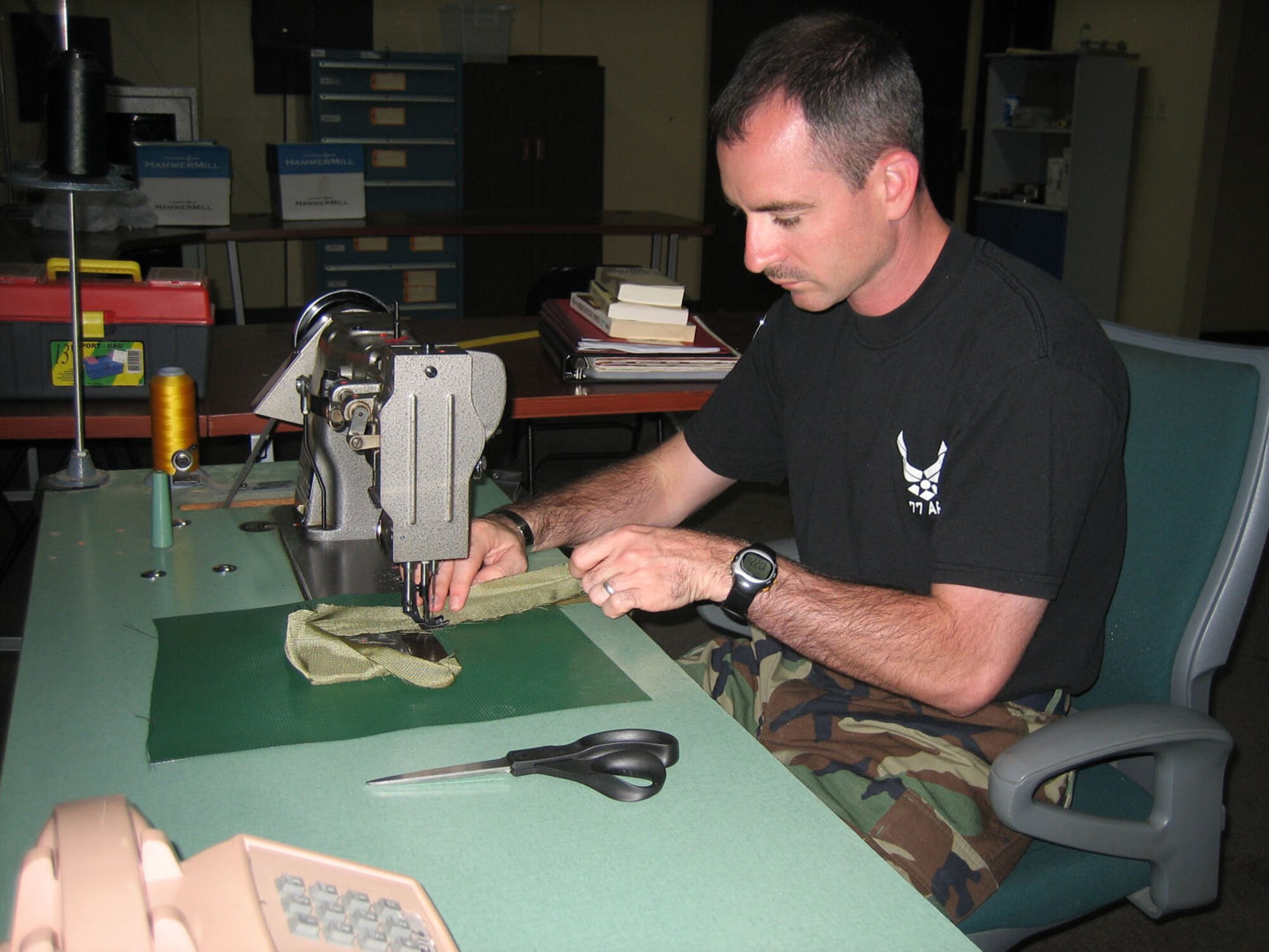 SEYMOUR JOHNSON AIR FORCE BASE, N.C. -- Tech. Sgt. Jason Fisch, a Reservist with the 916th Air Refueling Wing, repairs a piece of survival equipment while on deployment to Incirlik, Turkey. More than 100 members from the eastern North Carolina tanker wing deployed to Turkey in mid-August to support the Air Expeditionary Force. Reservists included aircrews, maintainers and support personnel.