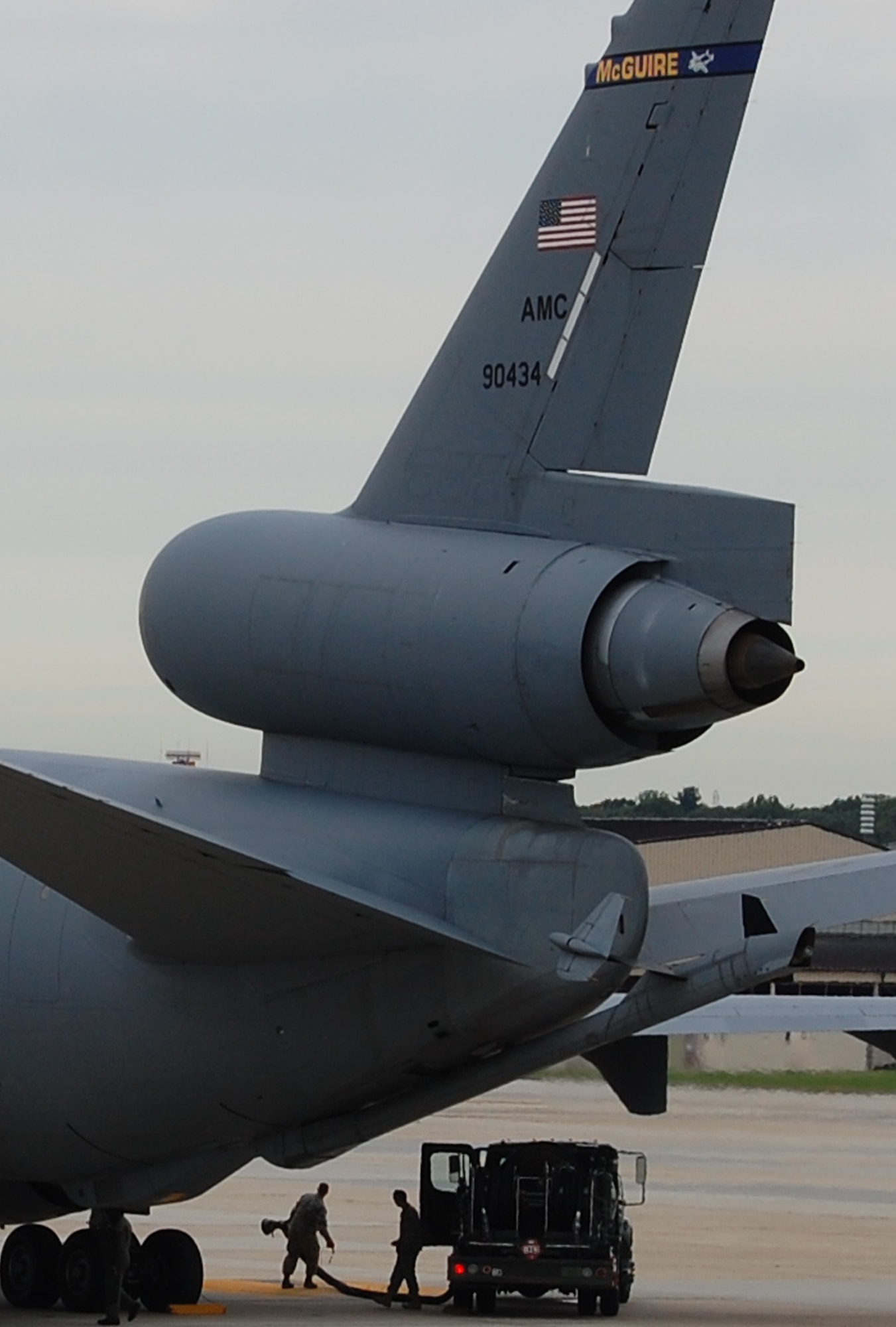 Fuels Airmen at McGuire Air Force Base, N.J., prepare to fuel a KC-10 Extender during operations on the McGuire flightline Sept. 16, 2008. The KC-10 is one of the main aircraft types stationed at McGuire which helps Air Mobility Command and the Air Force to "fly, fight and win...in air, space and cyberspace."  (U.S. Air Force Photo/Tech. Sgt. Scott T. Sturkol)