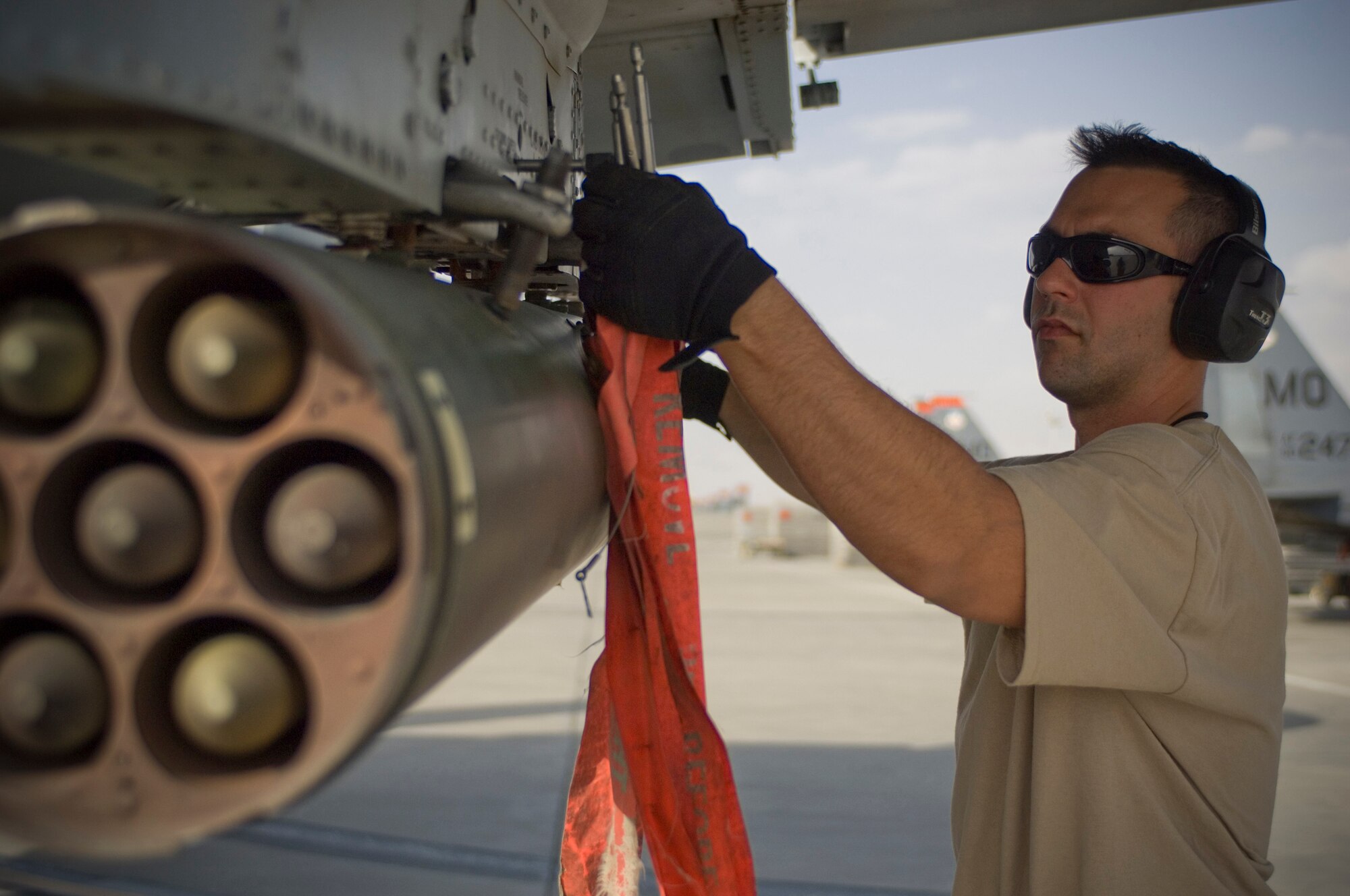 A crew chief with the 455th Expeditionary Aircraft Maintenance Squadron, removes the final tags on an A-10 Thunderbolt II just prior to a close air support mission at Bagram Air Field, Afghanistan, Sept. 12. Aircrew and maintainers from the 111th Fighter Wing, an Air National Guard unit from Pennsylvania, are preparing to head home after what could be their last combat deployment with the A-10. The 111th FW is scheduled to lose the A-10 beginning in the spring of 2009. (U.S. Air Force photo by Staff Sgt. Rachel Martinez/Released)