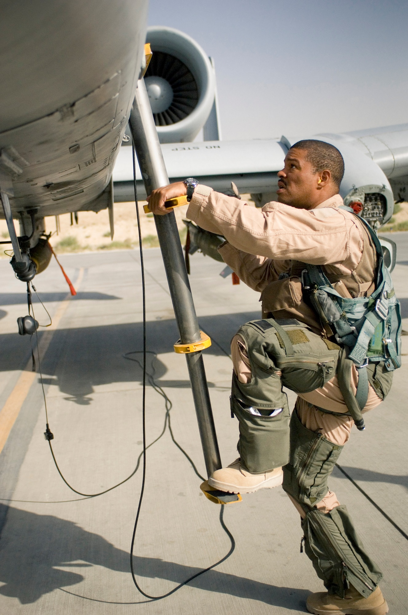 Lt. Col. Thomas Fennell, a pilot with the 103rd Expeditionary Fighter Squadron, climbs aboard an A-10 Thunderbolt II prior to a mission at Bagram Air Field, Afghanistan, Sept. 12. Colonel Fennell is finishing up what will most likely be his last combat deployment with the A-10. As part of the 111th Fighter Wing, a Pennsylvania Air National Guard unit, the 103rd FS is scheduled to lose its aircraft in the spring of 2009. (U.S. Air Force photo by Staff Sgt. Rachel Martinez/Released)