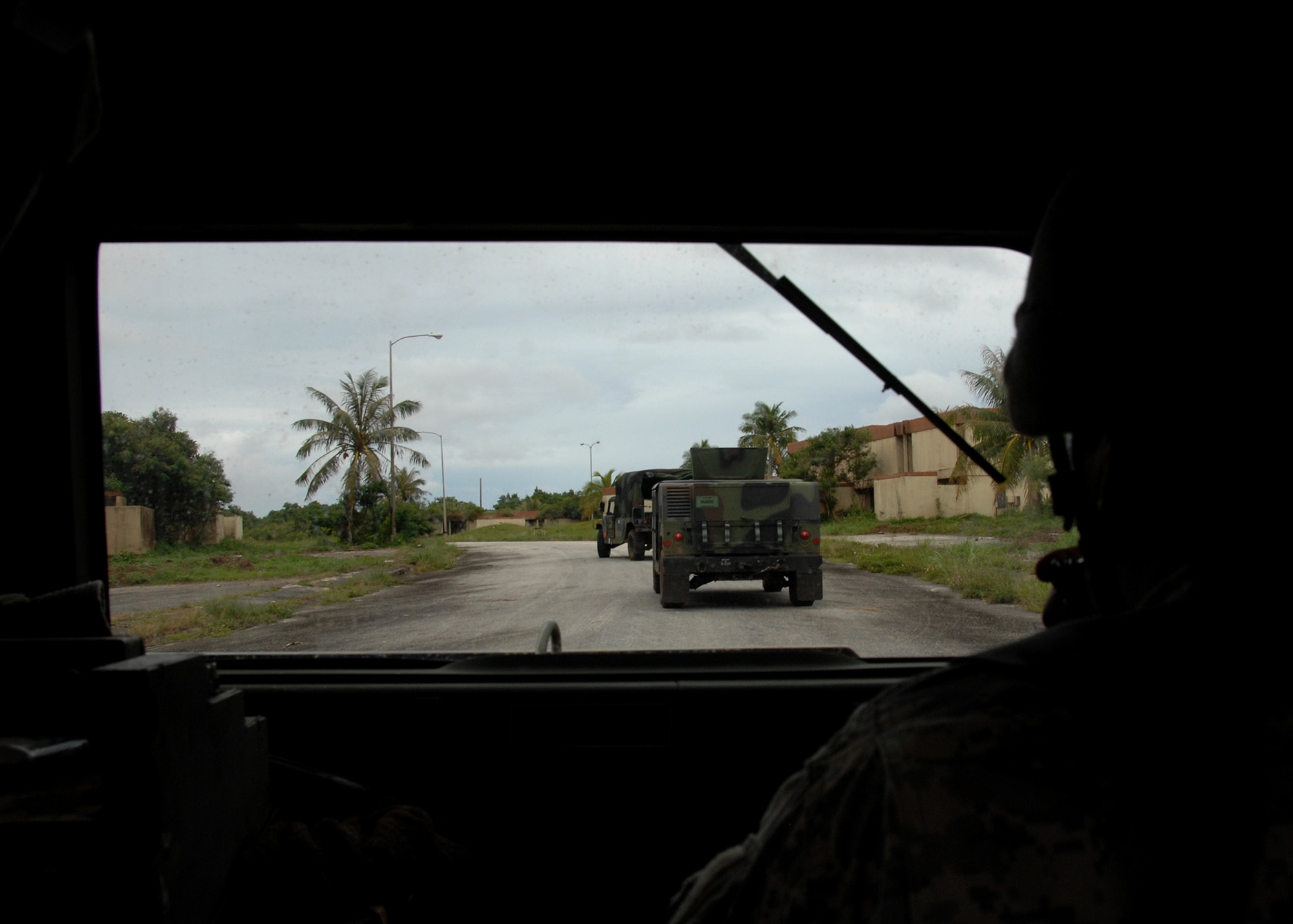 ANDERSEN AIR FORCE BASE, Guam - Members of the U.S. Air Force, U.S. Navy and the U.S. Army National Guard Guam use HUMVEES for training in tactical convoy operations for TRICRAB '08 scenarios. The Army National Guard played a vital role as site and perimeter security during all field training scenarios Sept. 14-18 at Andersen South. (U.S. Air Force photo by Airman 1st Class Nichelle Griffiths)      