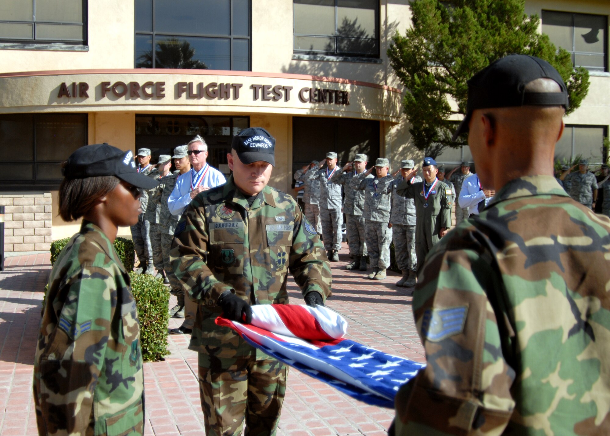In honor of 10 servicemembers and two civilians who have recently returned from deployment and to mark the 61st anniversary of the inception of the Air Force a retreat ceremony was held in front of the Air Force Flight Test Center Sept. 18. (Air Force photo by Airman 1st Class William O’Brien)