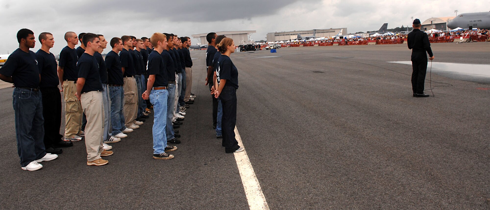 Members of the 319th Recruiting Squadron Delayed Entry Program show their dedication to joining the Air Force by publicly stating the oath of enlistment Sept. 7 at the Great New England Air Show on Westover Air Reserve Base, Mass. Thousands of people gathered on the flight line to watch the event conducted by the U.S. Air Force Thunderbirds and the team’s aerial demonstrations. (U.S. Air Force photo/Staff Sgt. Kristi Machado)
