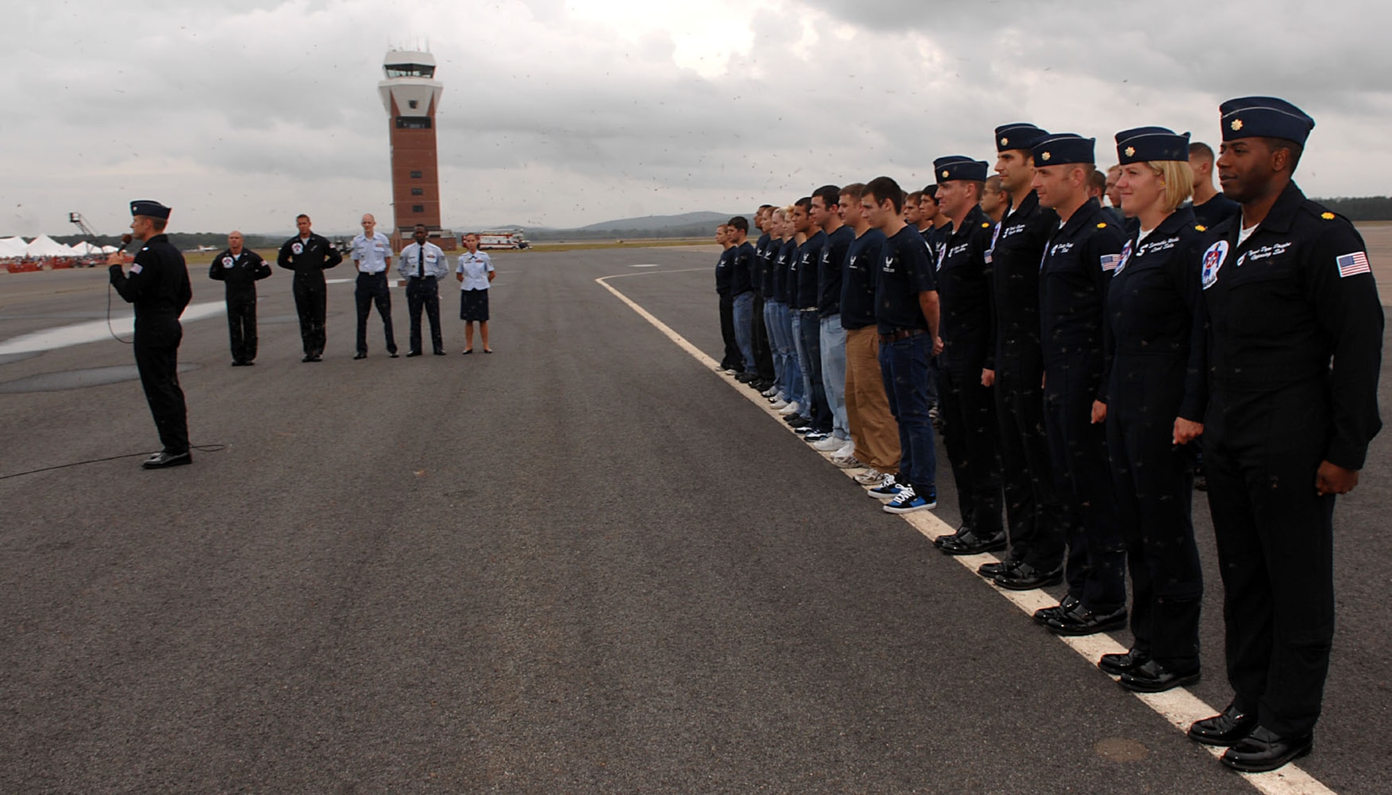 Members of the 319th Recruiting Squadron Delayed Entry Program show their dedication to joining the Air Force by publicly stating the oath of enlistment Sept. 7 at the Great New England Air Show on Westover Air Reserve Base, Mass. Thousands of people gathered on the flight line to watch the event conducted by the U.S. Air Force Thunderbirds and the team’s aerial demonstrations. (U.S. Air Force photo/Staff Sgt. Kristi Machado)