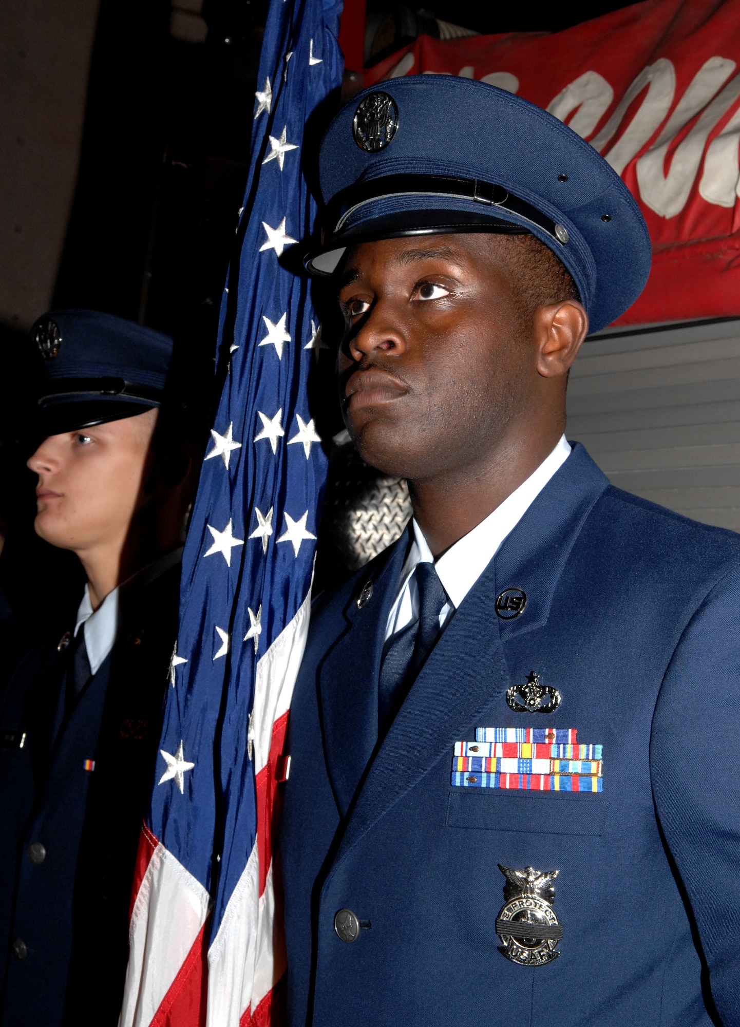 Staff Sgt. Phillip Burns, 49th Civil Engineer Squadron and member of the Steel Talon Honor Guard at Holloman Air Force Base, N.M., awaits his cue to Post the Colors at the seventh annual 9/11 Memorial Ceremony at the New Mexico Museum of Space History, September 11.  After the posting of the colors, National Anthem and invocation, Chief Wayne Mello Sr. spoke about terrorism, followed by a candle-lighting ceremony. (U.S. Air Force photo/Airman Sondra M. Escutia)