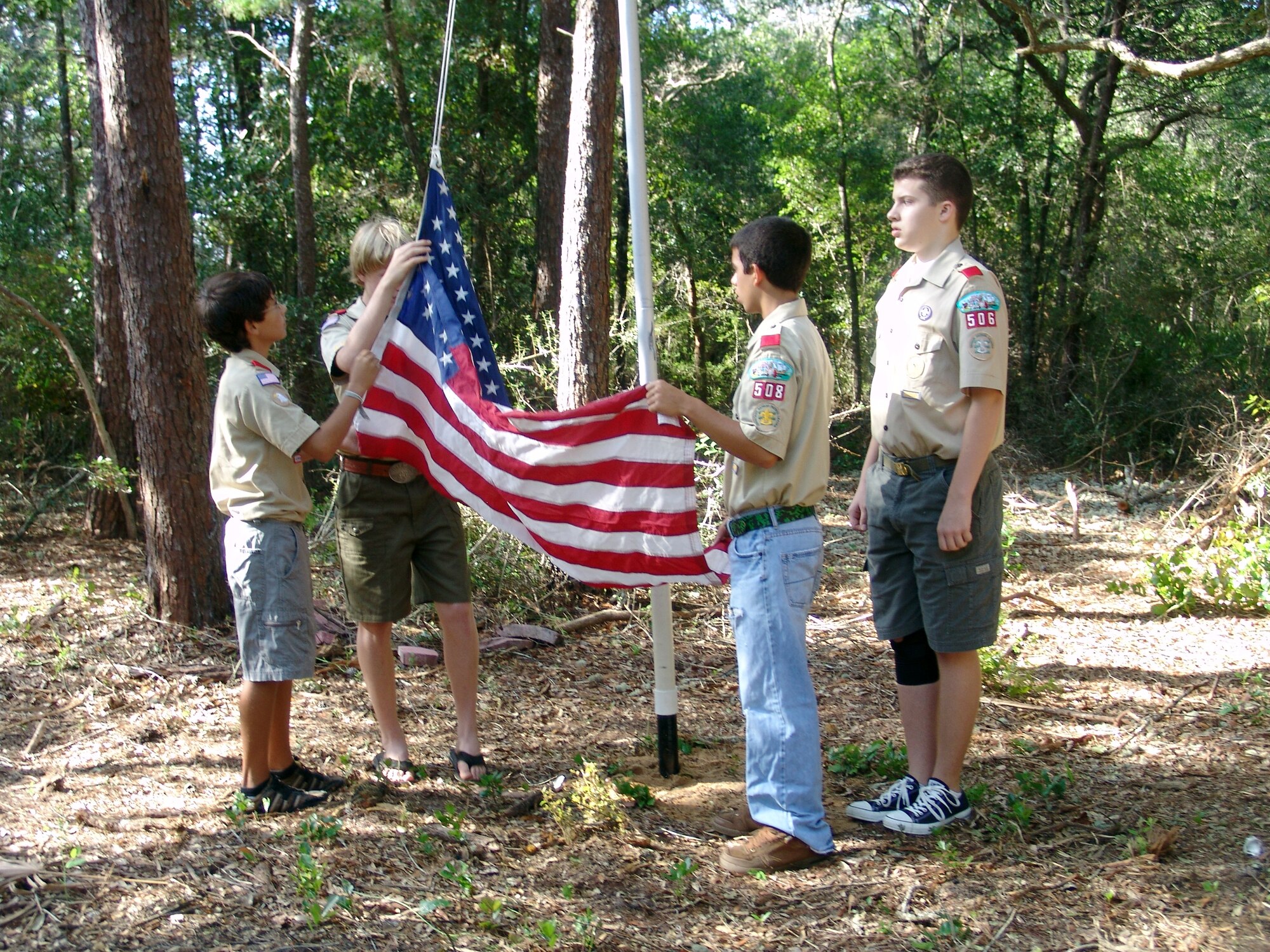 EGLIN AIR FORCE BASE, Fla. -- Members of the Boys Scouts of America Troop 506 were on hand to celebrate the Woodland Trails Youth Camp reopening Sept. 13. The camp originally opened in 1967 and boasted overnight camping trips and a nature trail. (U.S. Air Force photo/ Marie Vanover)                               
