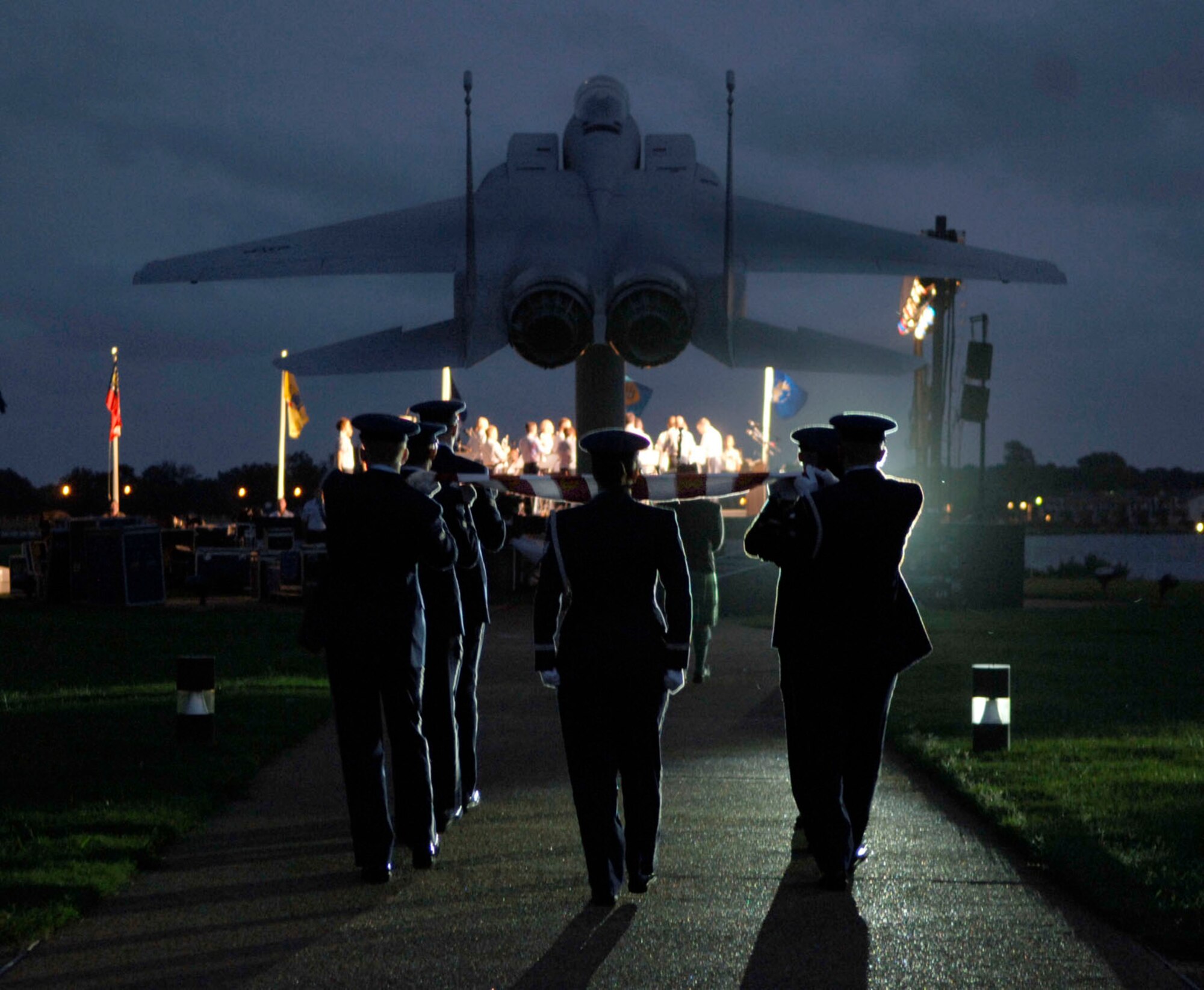 LANGLEY AIR FORCE BASE, Va.-- The Langley Honor Guard prepares to fold the flag during the Air Combat Command Tattoo ceremony Sept. 11. The Tattoo was a mixture of music, lights and fireworks honoring the nation's military, past and present. (U.S. Air Force photo/Airman Rebecca Montez)