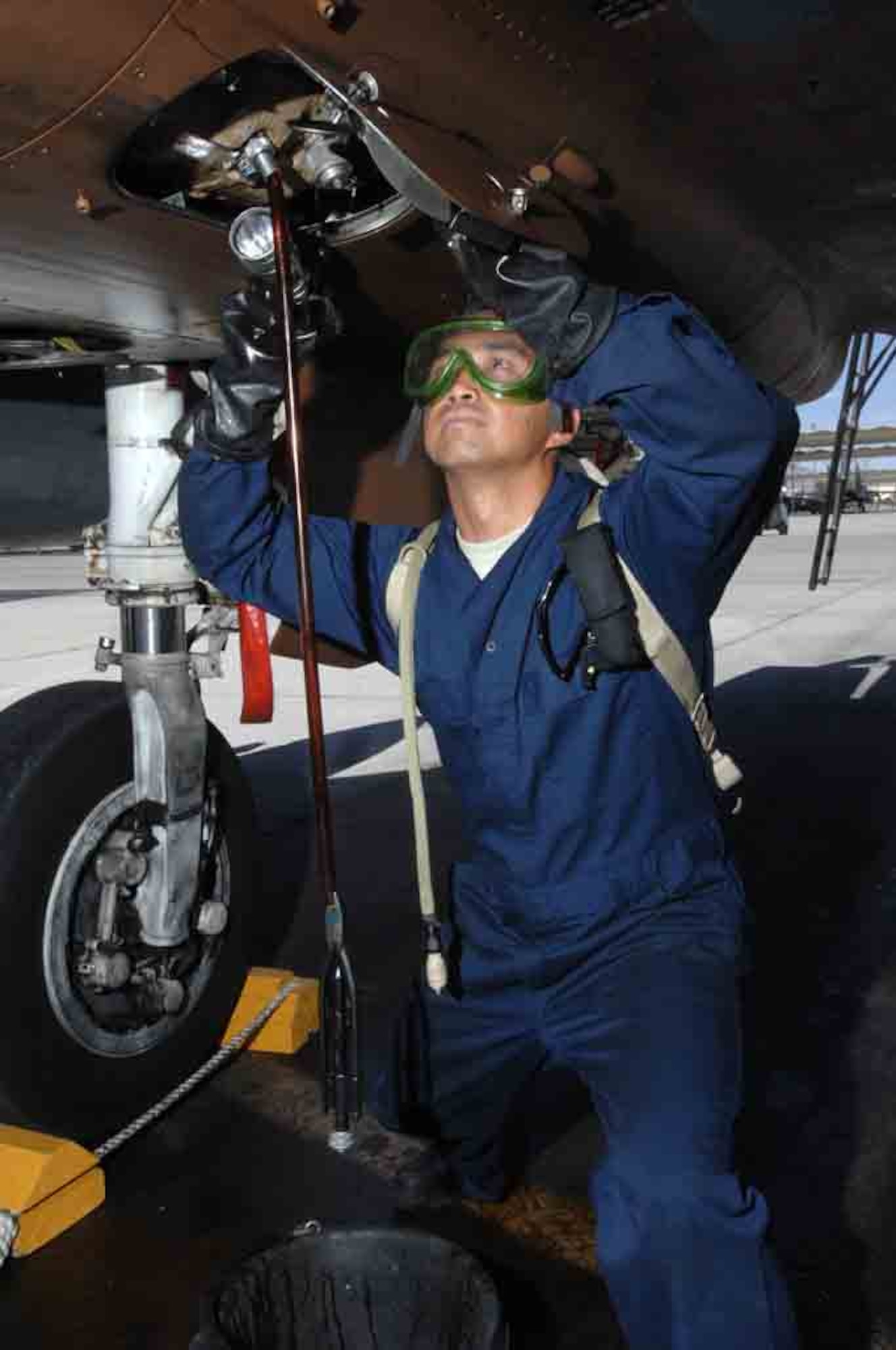 Staff Sgt. Raymond Oliveros, an F-15 crew chief assigned to the 926th Group Detachment 2, services a generator on an F-15 July 24, 2008 at Nellis Air Force Base, Nev. The 926th Group is an Air Force Reserve unit under 10th Air Force, Naval Air Station Joint Reserve Base, Fort Worth, Texas. The group is located at Nellis AFB as an associate unit to the United States Air Force Warfare Center. Through Total Force Integration, reservists are integrated into regular Air Force units, accomplishing the USAFWC's mission alongside REGAF personnel on a daily basis.
(U.S. Air Force Photo/Senior Airman Larry E. Reid Jr., Released)