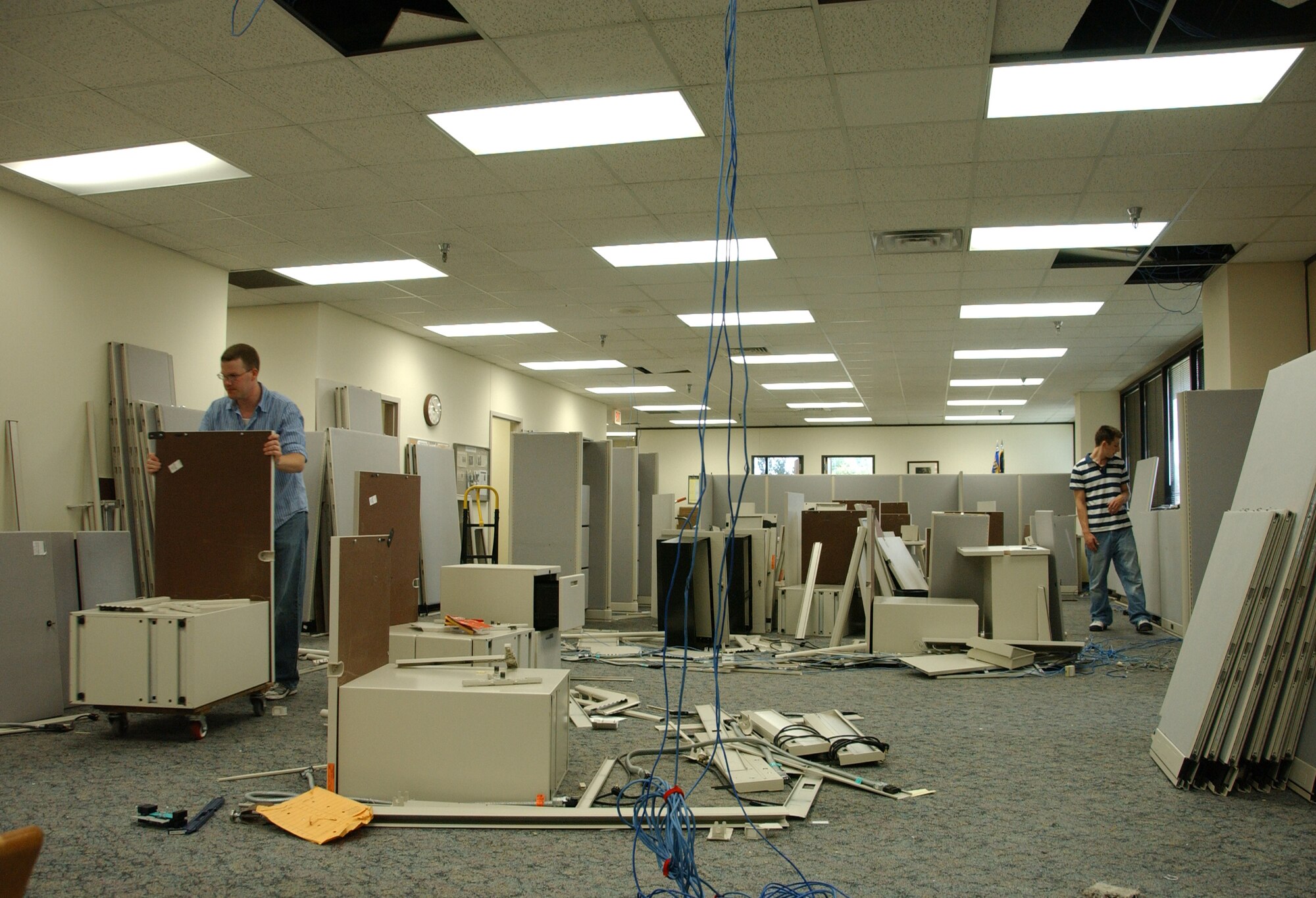 Contractors work to complete a furniture reconfiguration of the 71st Comptroller Squadron. Due to this project, finance customer service is closed Sept. 18-19. (U.S. Air Force photo by Staff Sgt. Brian Hill)