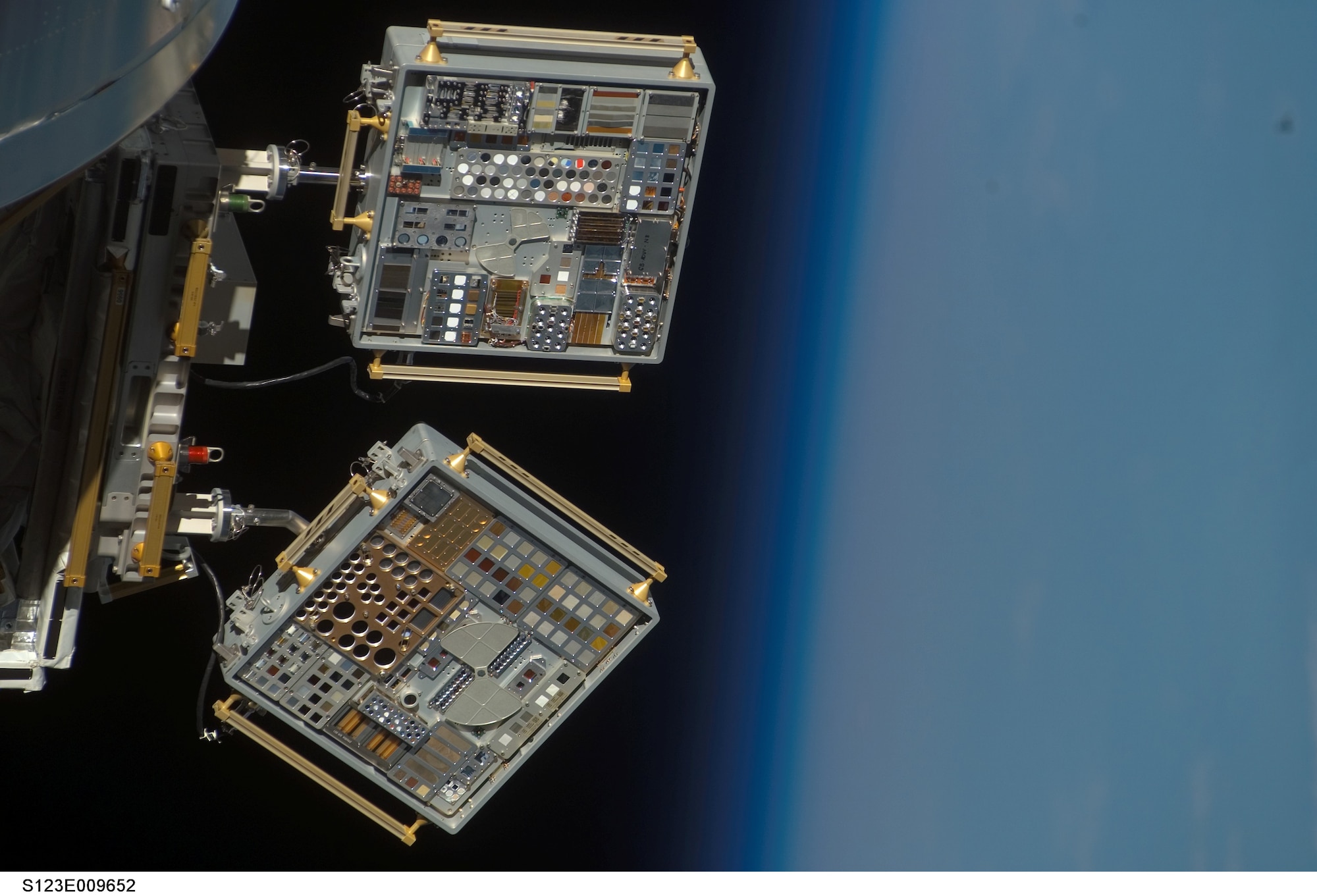 The Air Force Research Laboratory recently partnered with NASA to conduct materials experiments aboard the International Space Station. The Materials on the International Space Station Experiment (MISSE) program exposes materials in suitcase sized containers to orbit before returning them to Earth aboard the space shuttle.  Pictured is MISSE 6A and 6B. (NASA Photo)