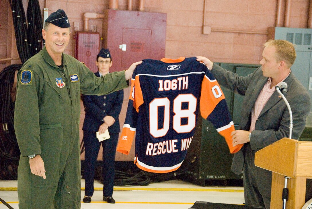 F.S. Gabreski Airport, Westhampton Beach, N.Y. -

Director of Operations for Promotions and Events for the Islanders hockey team presents Col. Michael F. Canders, 106th Rescue Wing Commander, with a custom jersey.

The 106th Rescue Wing hosts the roll out ceremony for the recently restored HH-3E Jolly Green Giant on September 6, 2008.

(Official USAF photo by SrA. Christopher S. Muncy)

